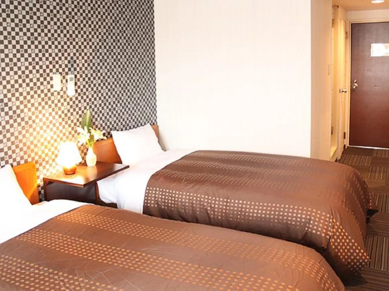 Bed in HOTEL LiVEMAX BUDGET Tokyo Hamura Ekimae