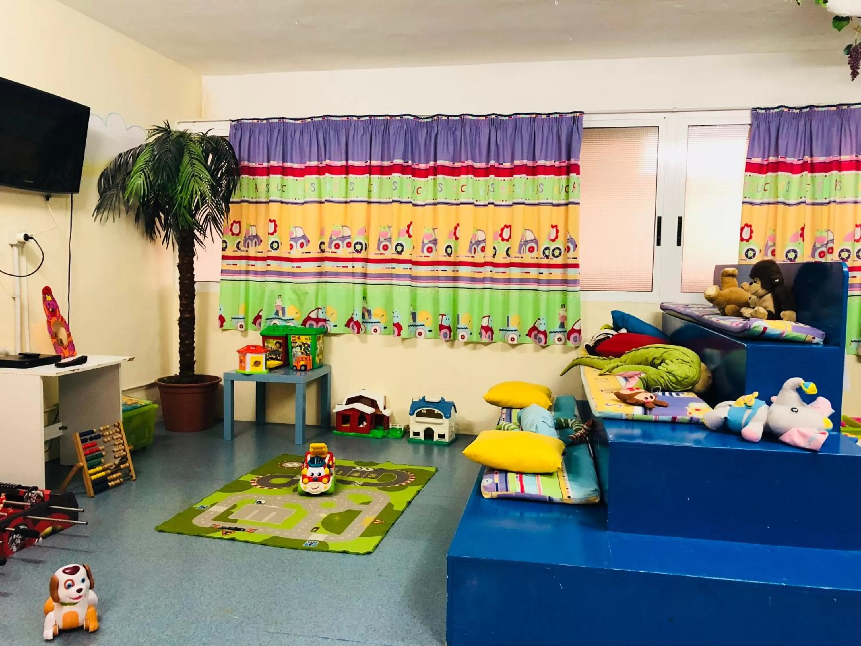 Kids's club in Regency Torviscas Apartments and Suites