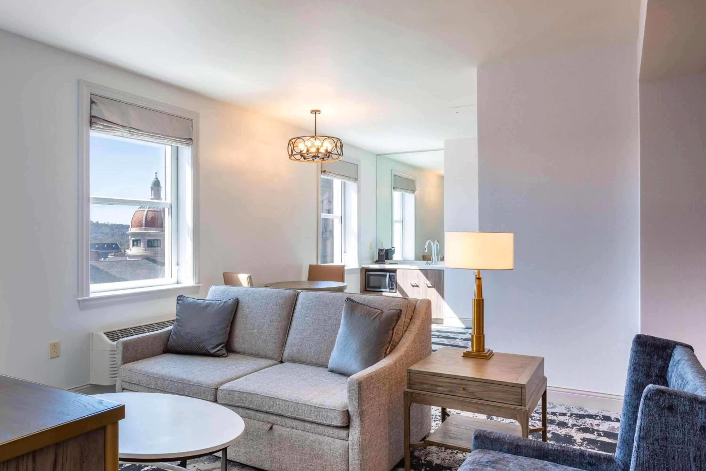 Living room in The Yorktowne Hotel, Tapestry Collection by Hilton