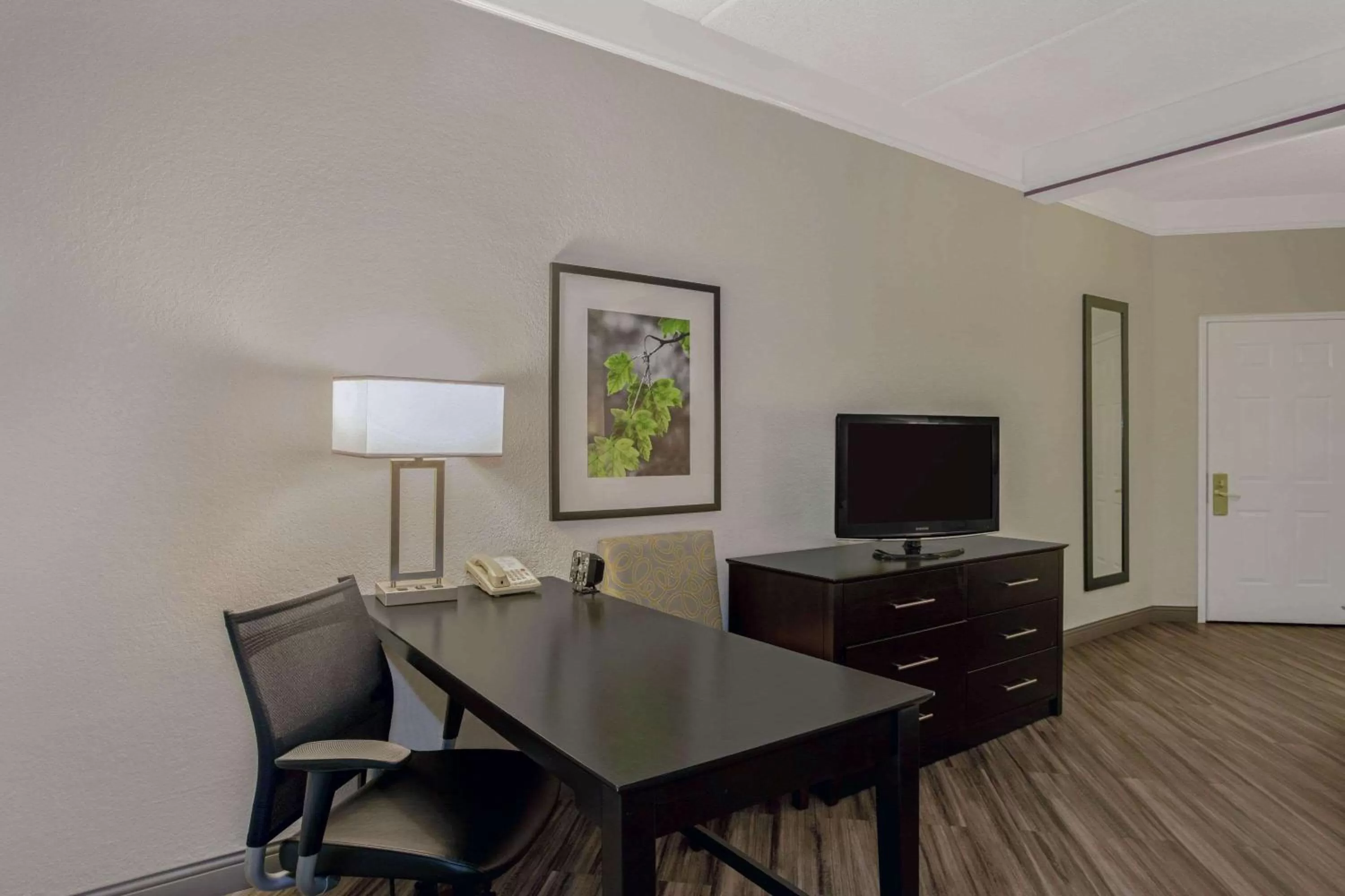 Photo of the whole room in La Quinta by Wyndham Orlando Airport North - Free Airport Shuttle!