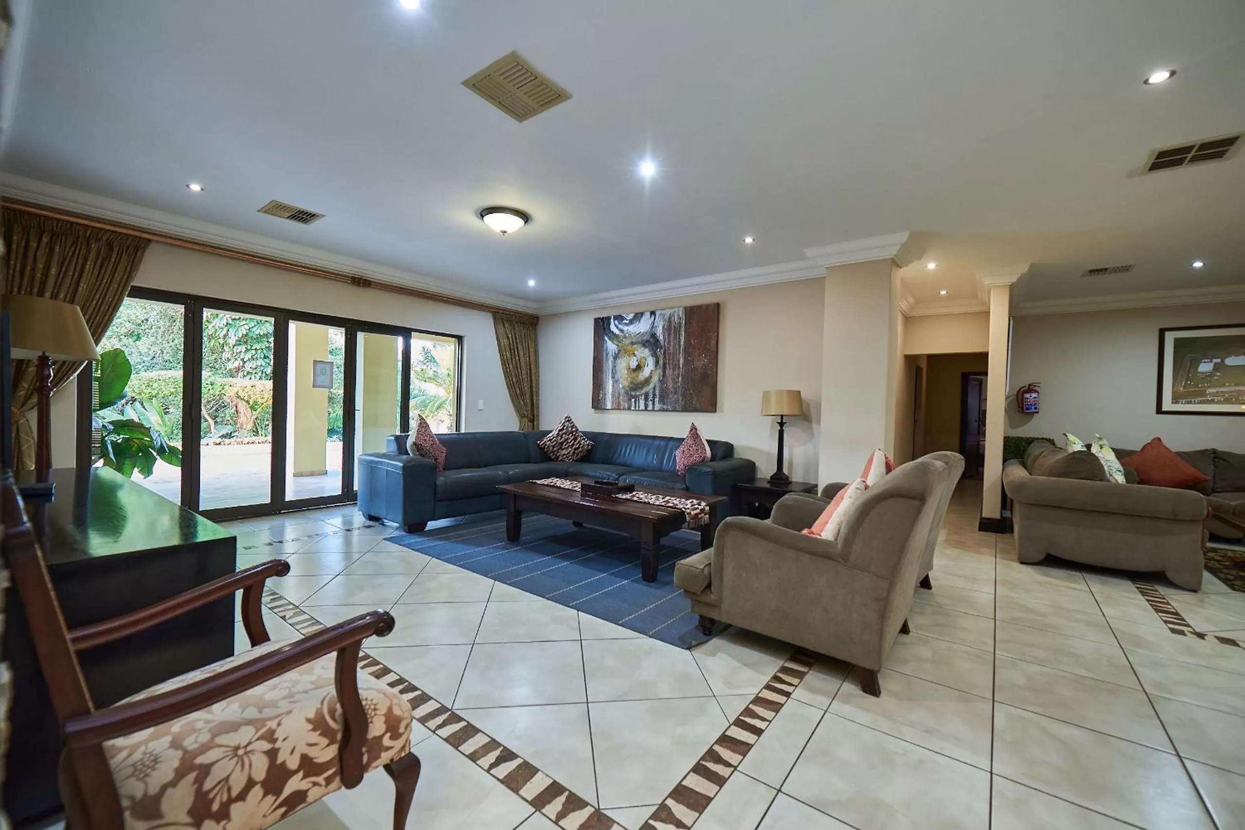 Communal lounge/ TV room in Ebandla Hotel & Conference Centre