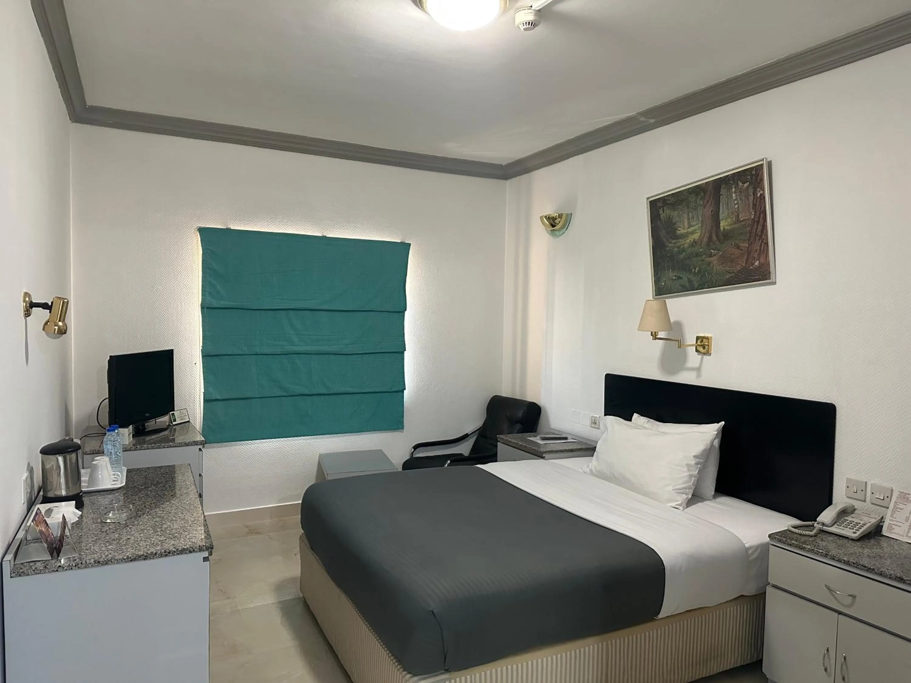 Bed in Grand Astoria Hotel