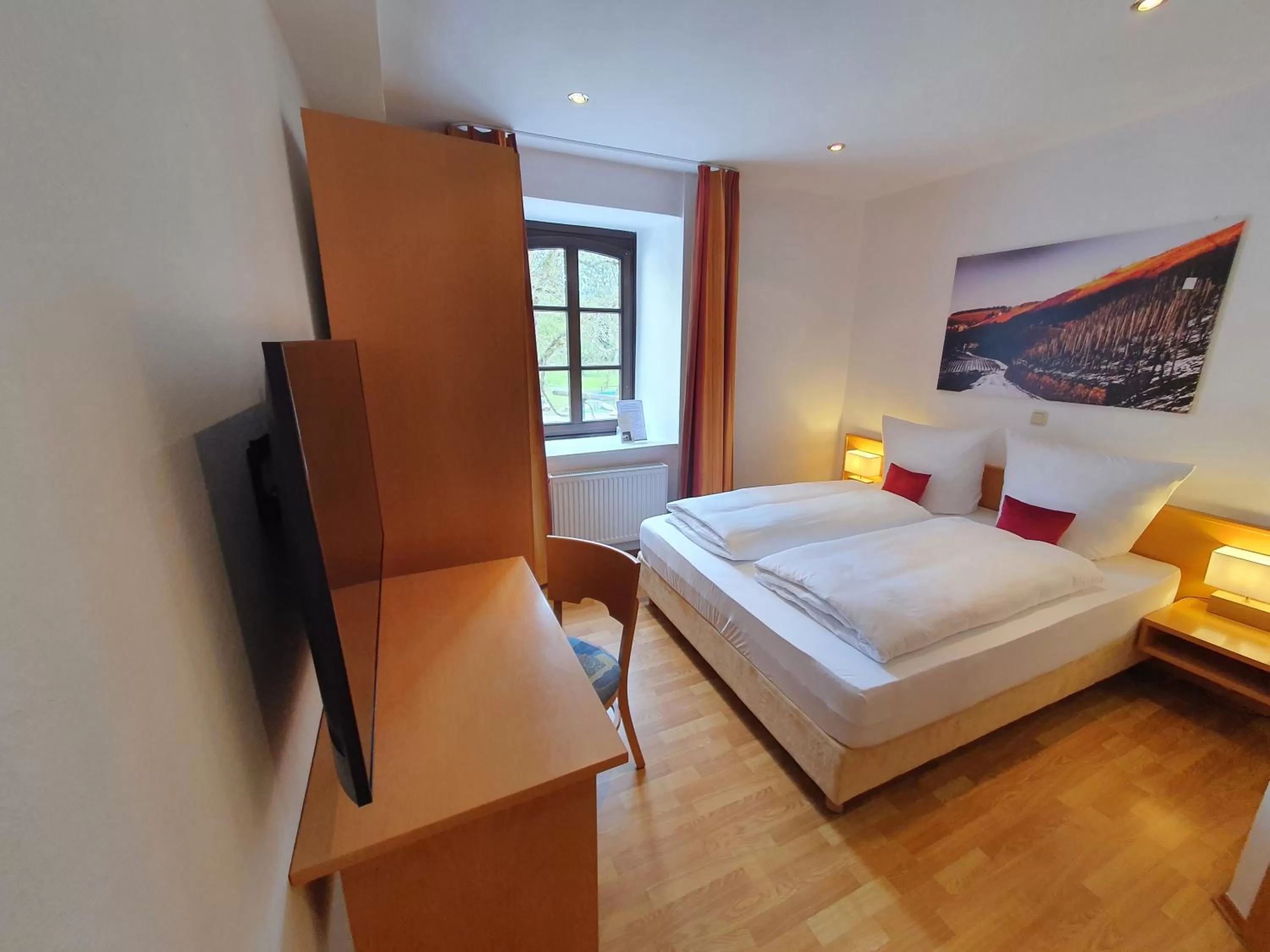 Photo of the whole room, Bed in Hotel und Weingut Karlsmühle