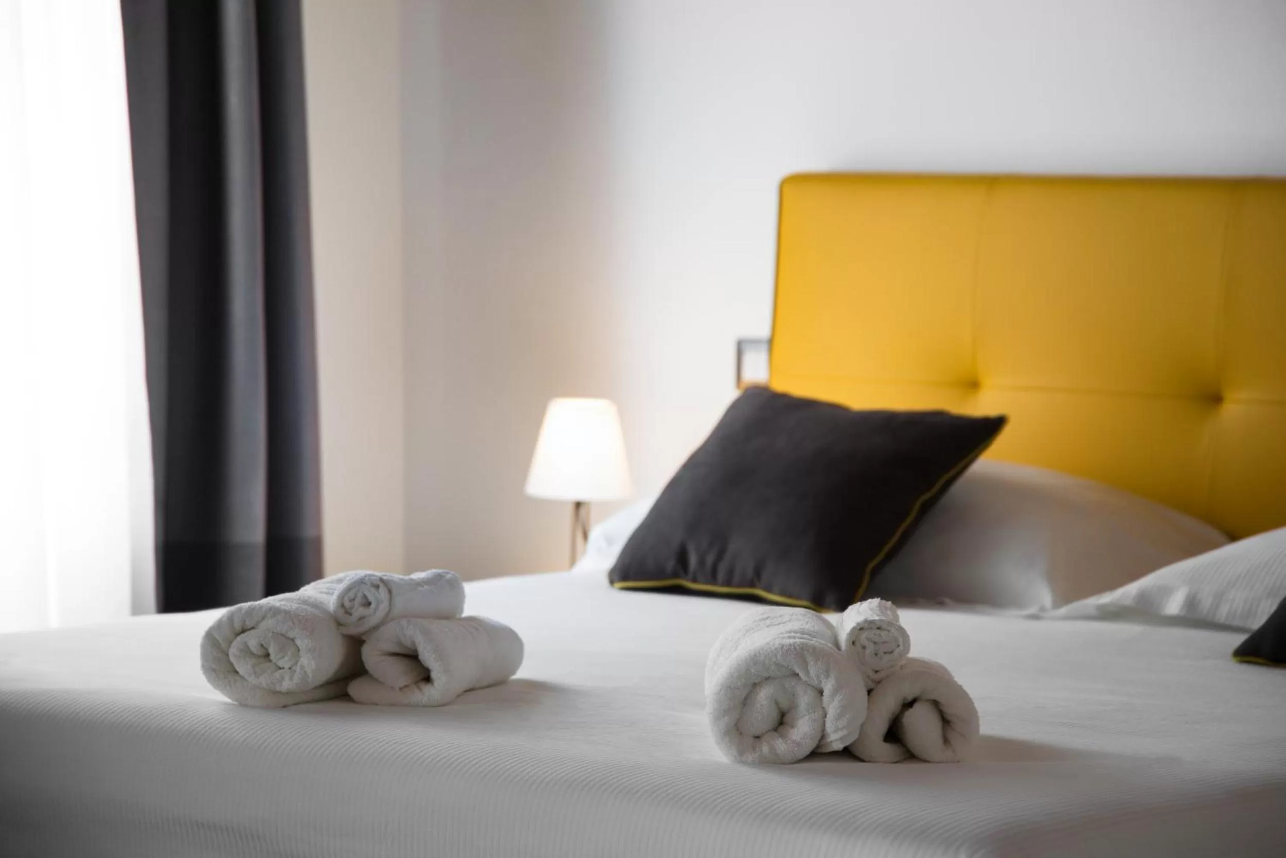 Bed in Interamnia Boutique Hotel