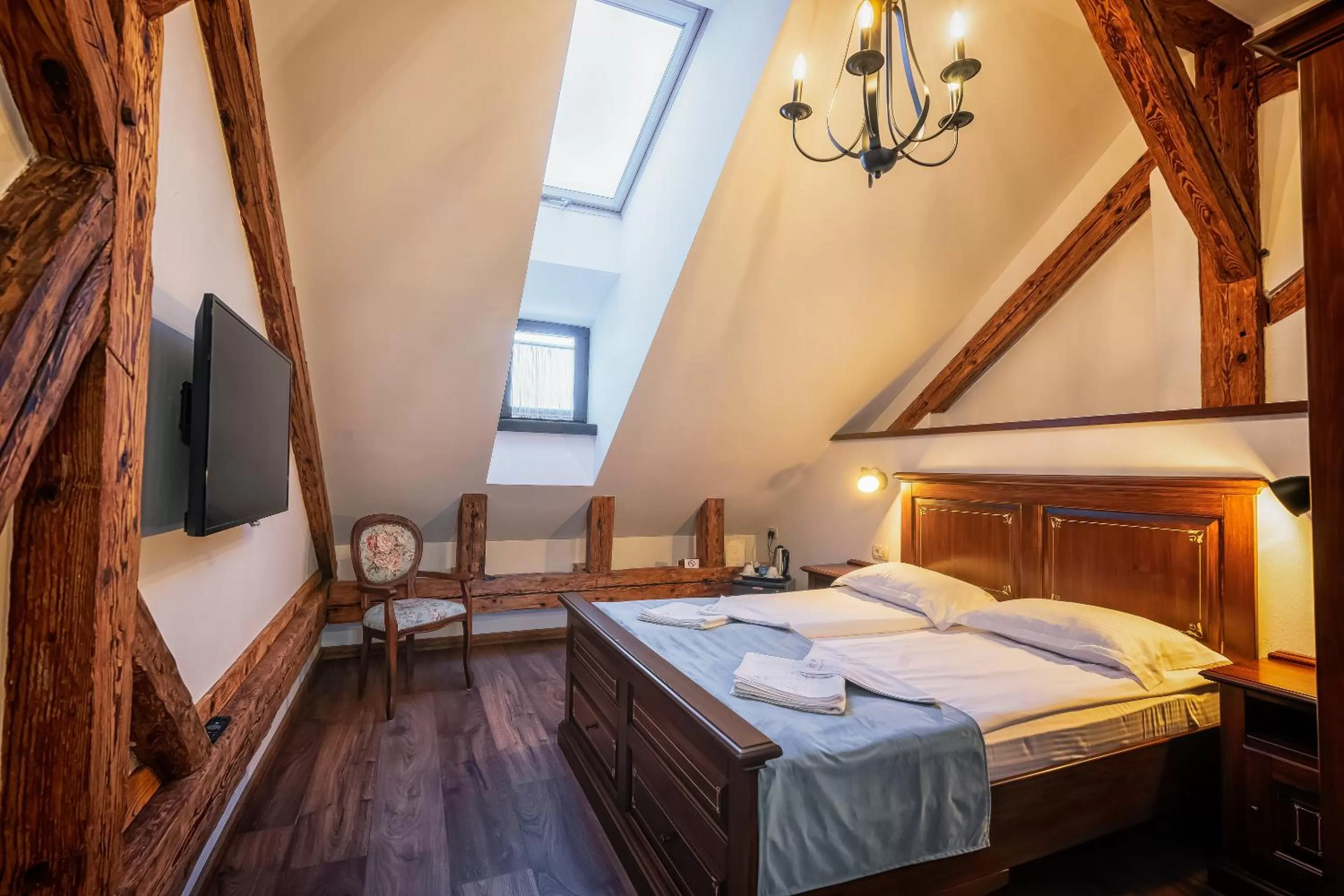 Bed in HOTEL BOUTIQUE CASA CHITIC -HOTEL AND RESTAURANT Str Johann Gott nr7