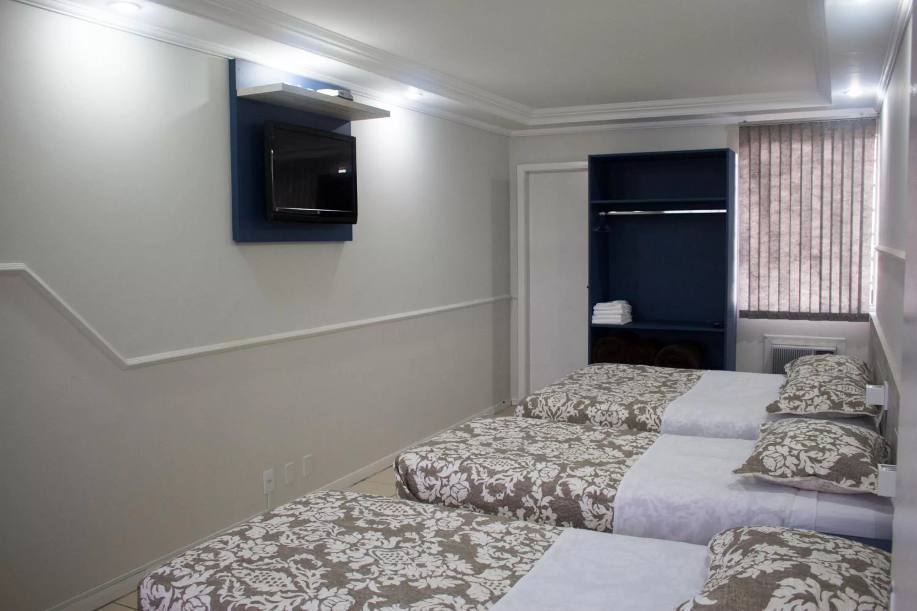 Bed in Hotel Dois Irmãos