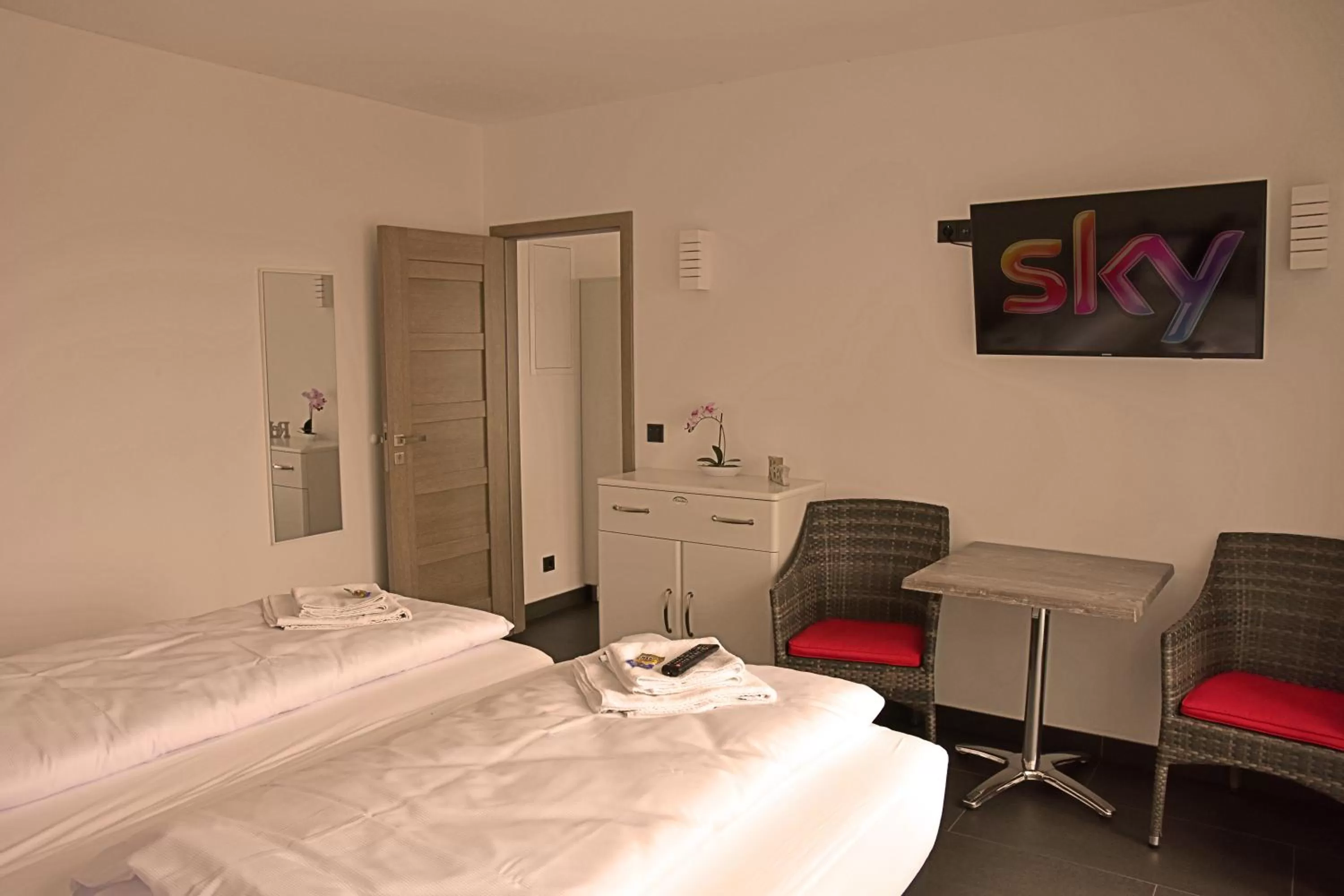 Photo of the whole room, Bed in Hotel Walsroder Hof