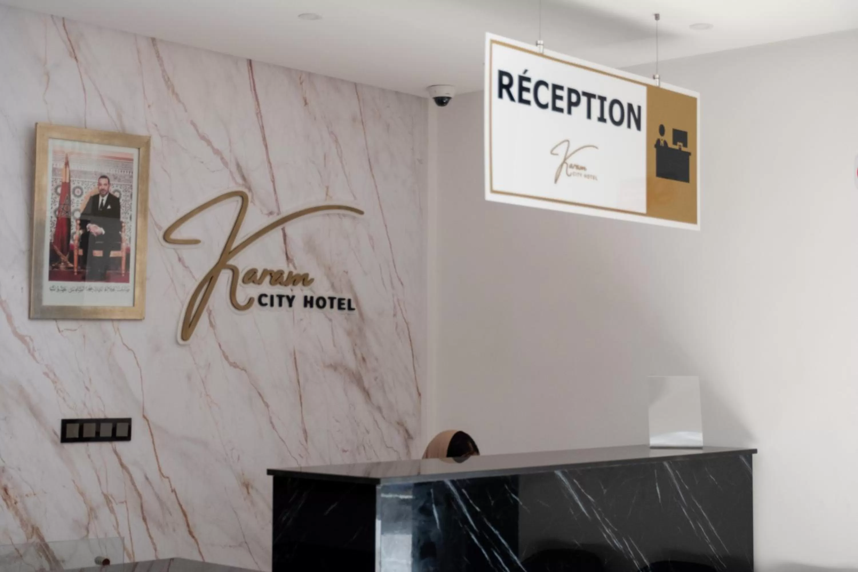 Property logo or sign in Karam City Hotel