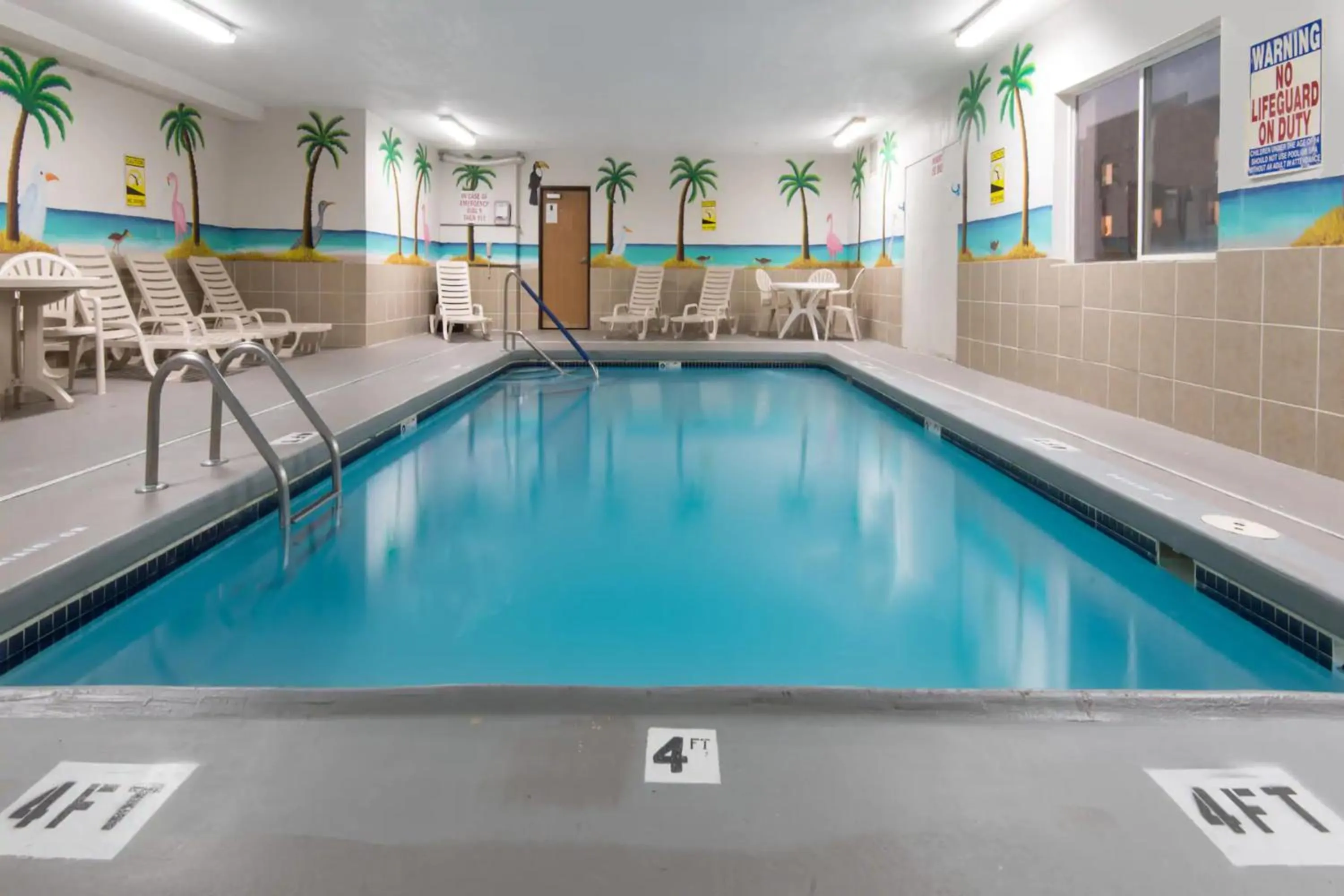 Swimming pool in Days Inn by Wyndham Kansas City International Airport
