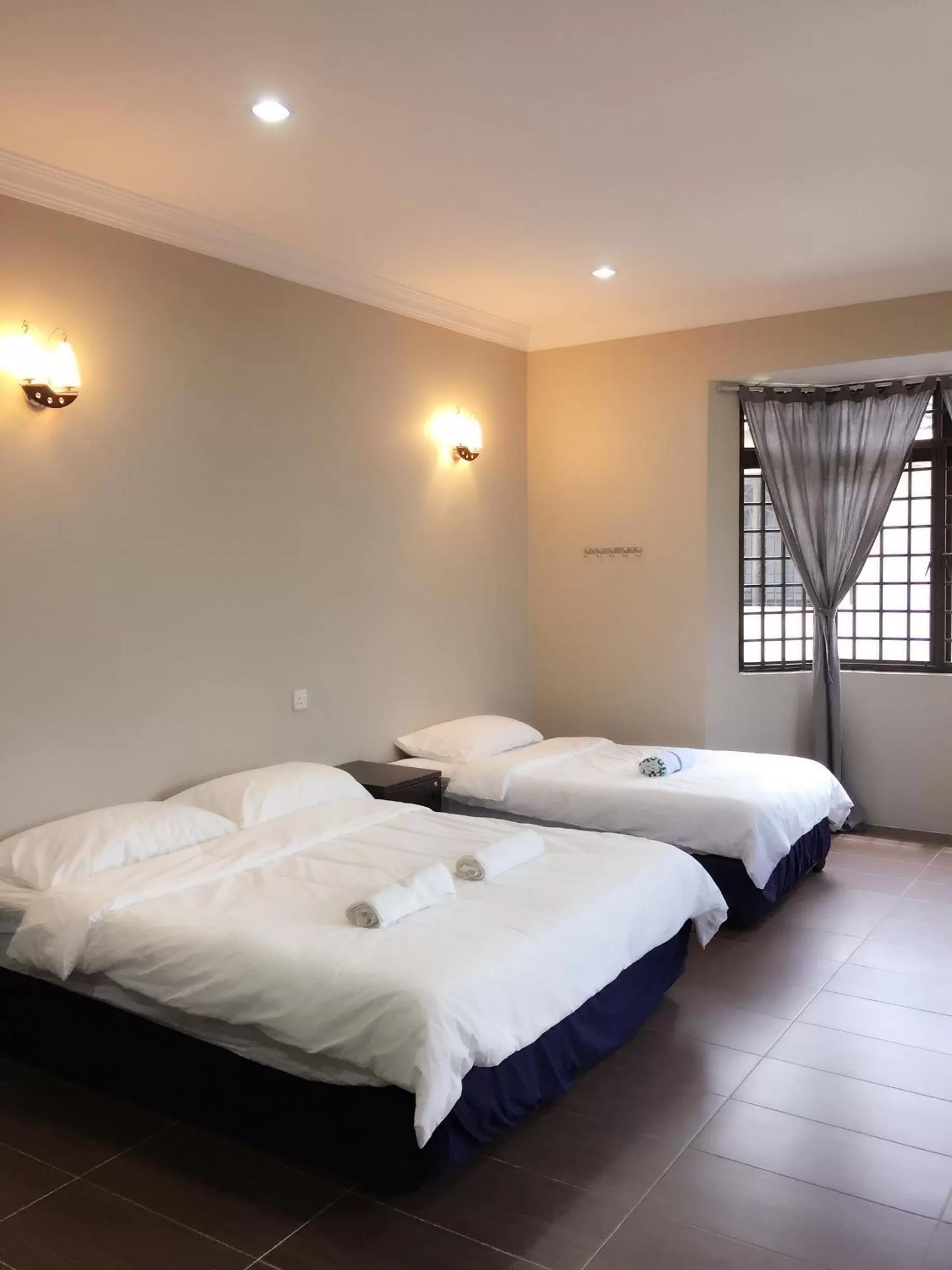 Photo of the whole room, Bed in Homestay Muar