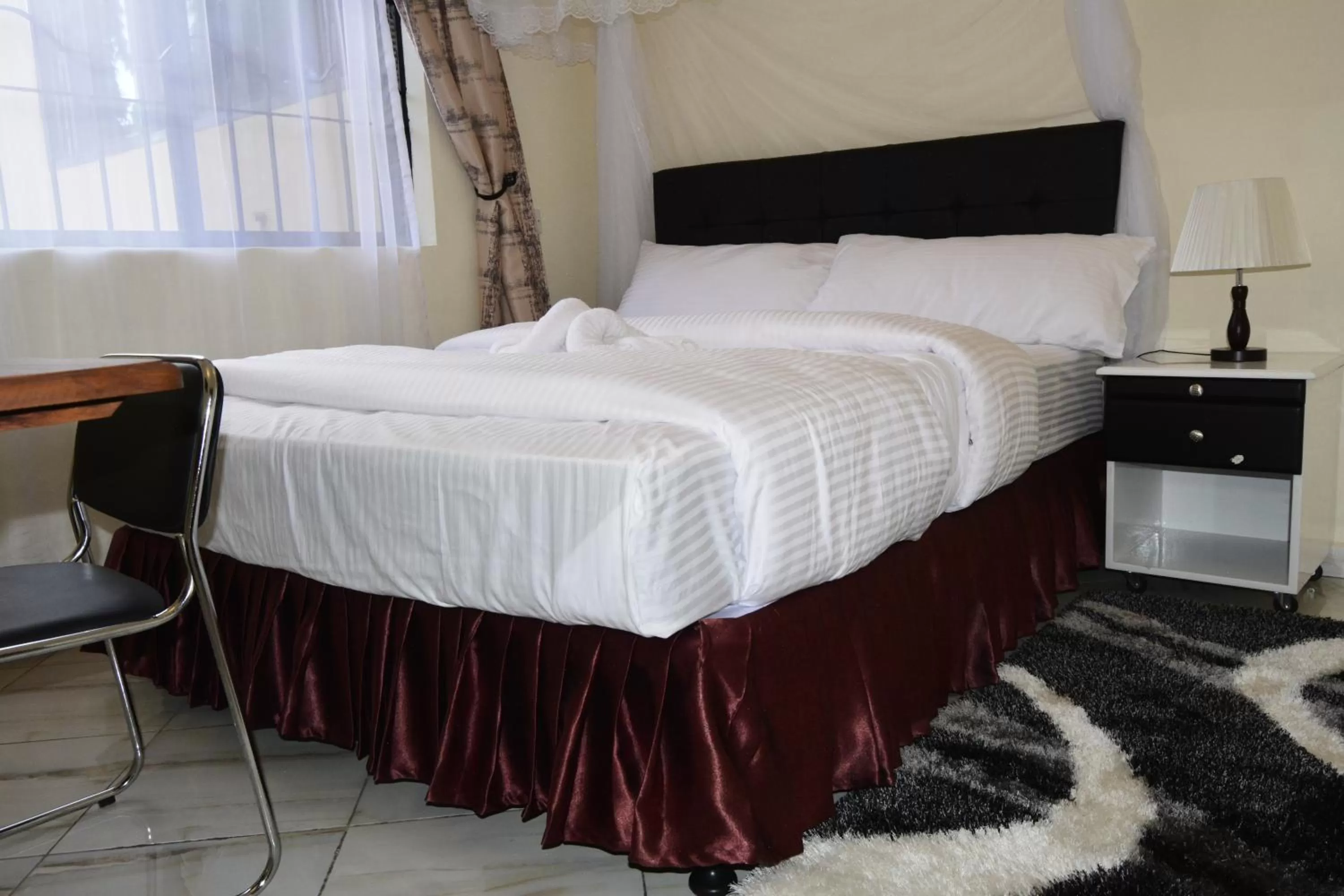 Bed in Africa Lodge Arusha