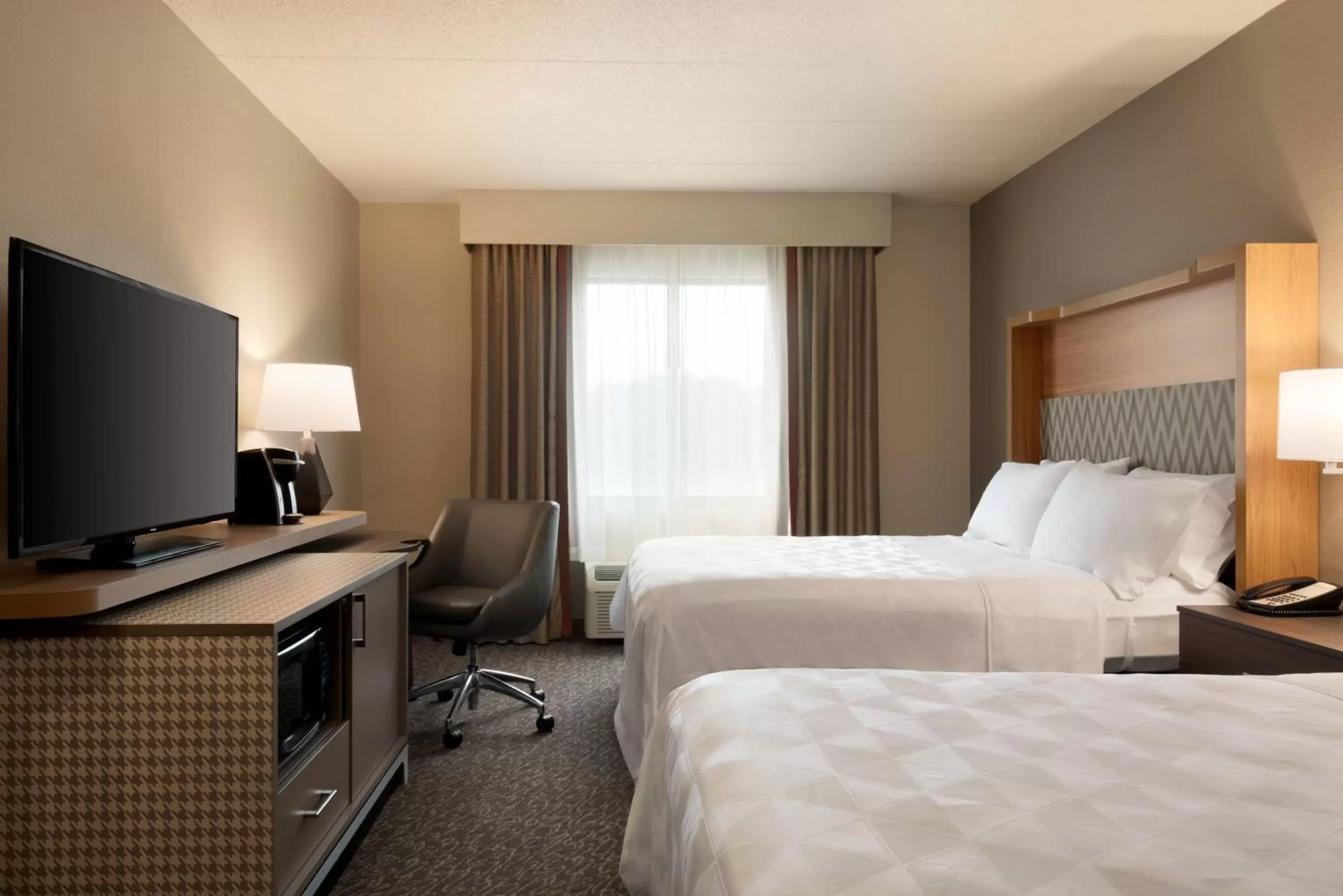 Queen Room with Two Queen Beds - Disability Access Hearing Accessible Tub in Holiday Inn Hotel & Suites Council Bluffs by IHG Queen Room with Two Queen Beds - Disability Access Hearing Accessible Tub in Holiday Inn Hotel & Suites Council Bluffs by IHG