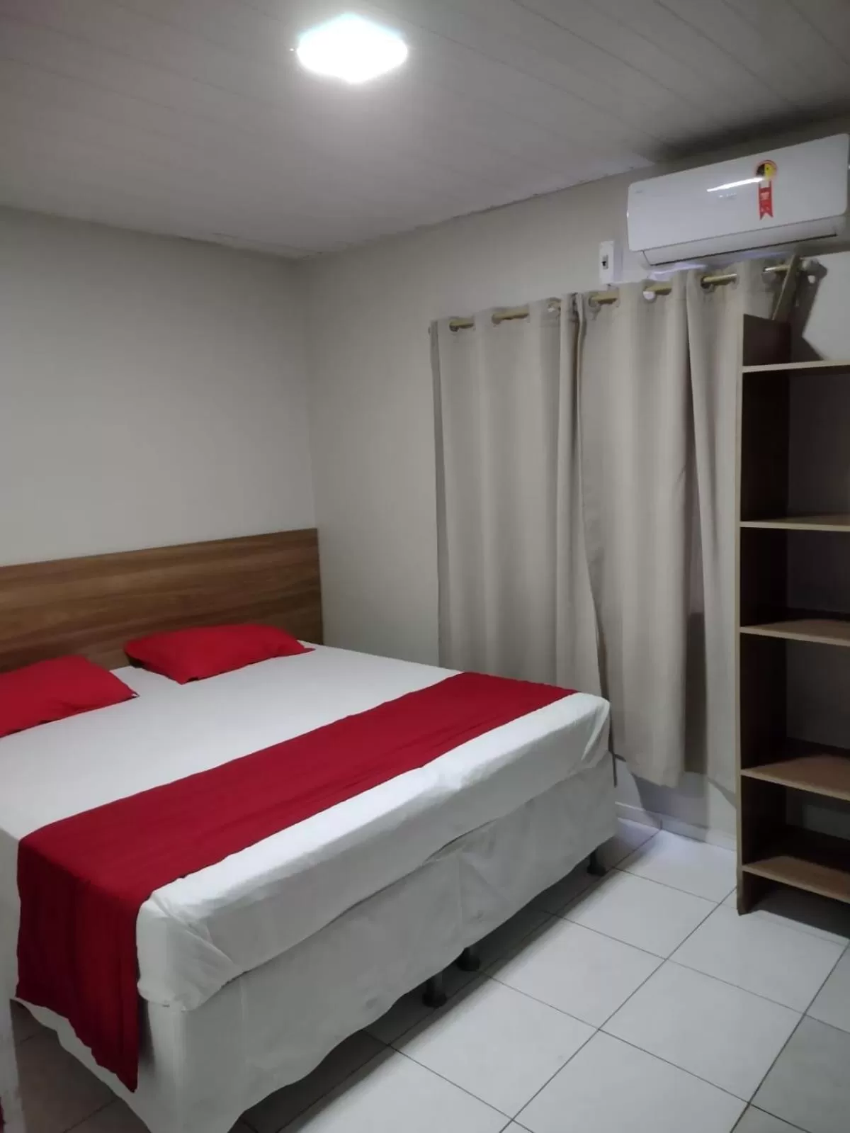 Bed in Nalu Beach Hotel pousada