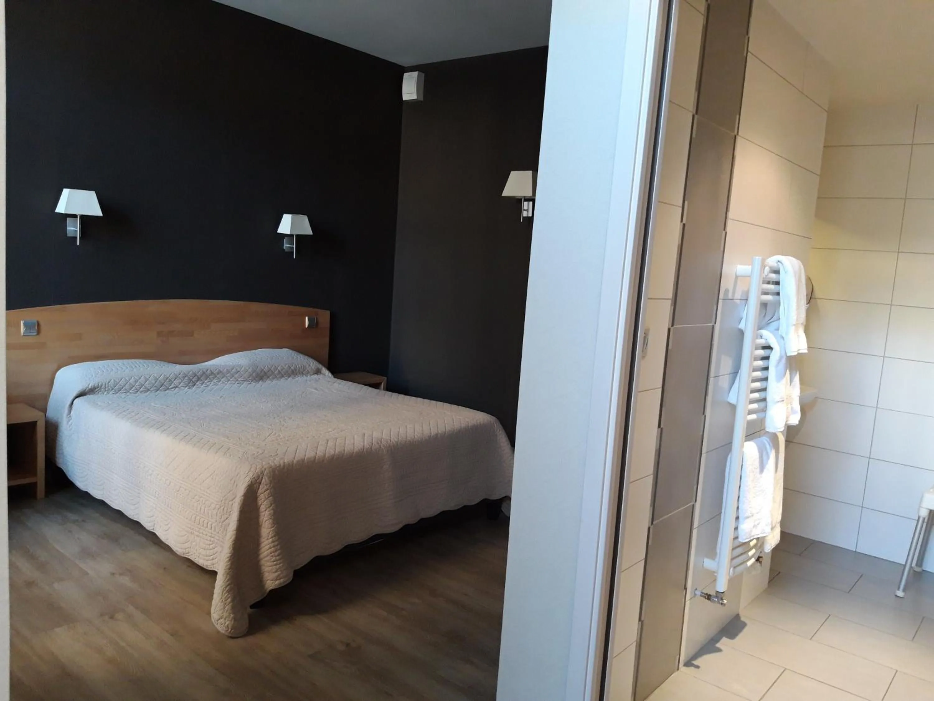 Bed in Hôtel la Guimbarde