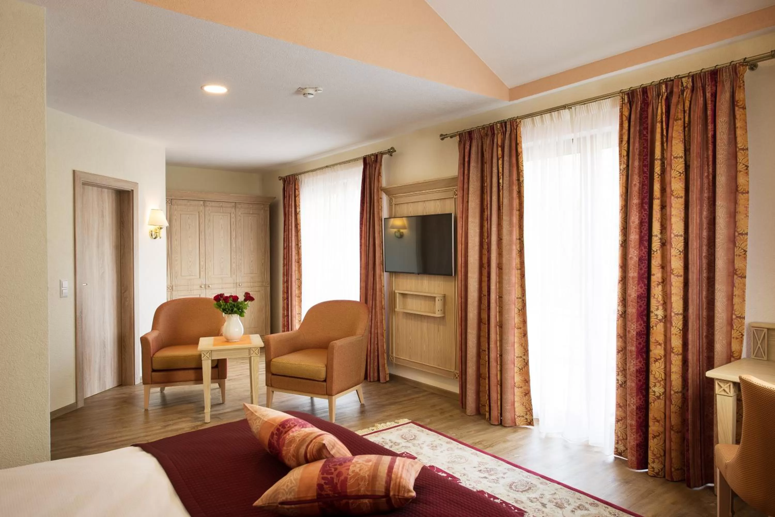 Seating area, Bed in Hotel Rebstock