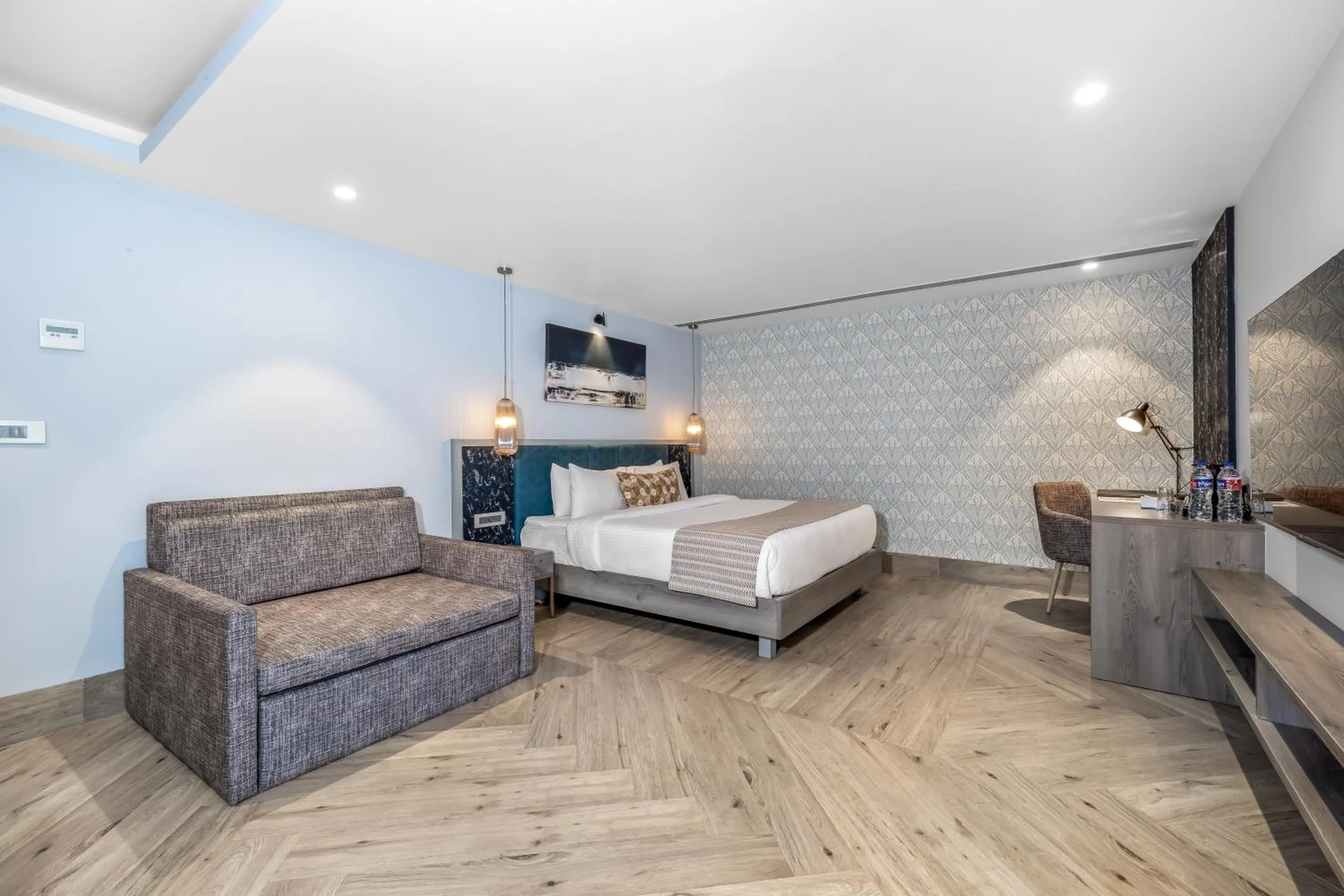 Photo of the whole room, Bed in Clarion Hotel Ocean Palms Goa