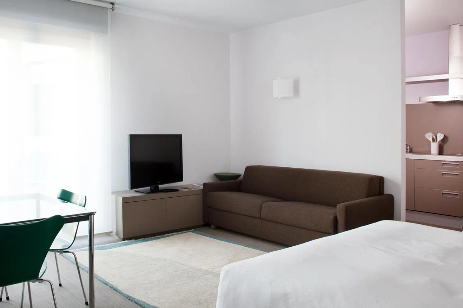 Seating area, Bed in Zambala Luxury Apartments