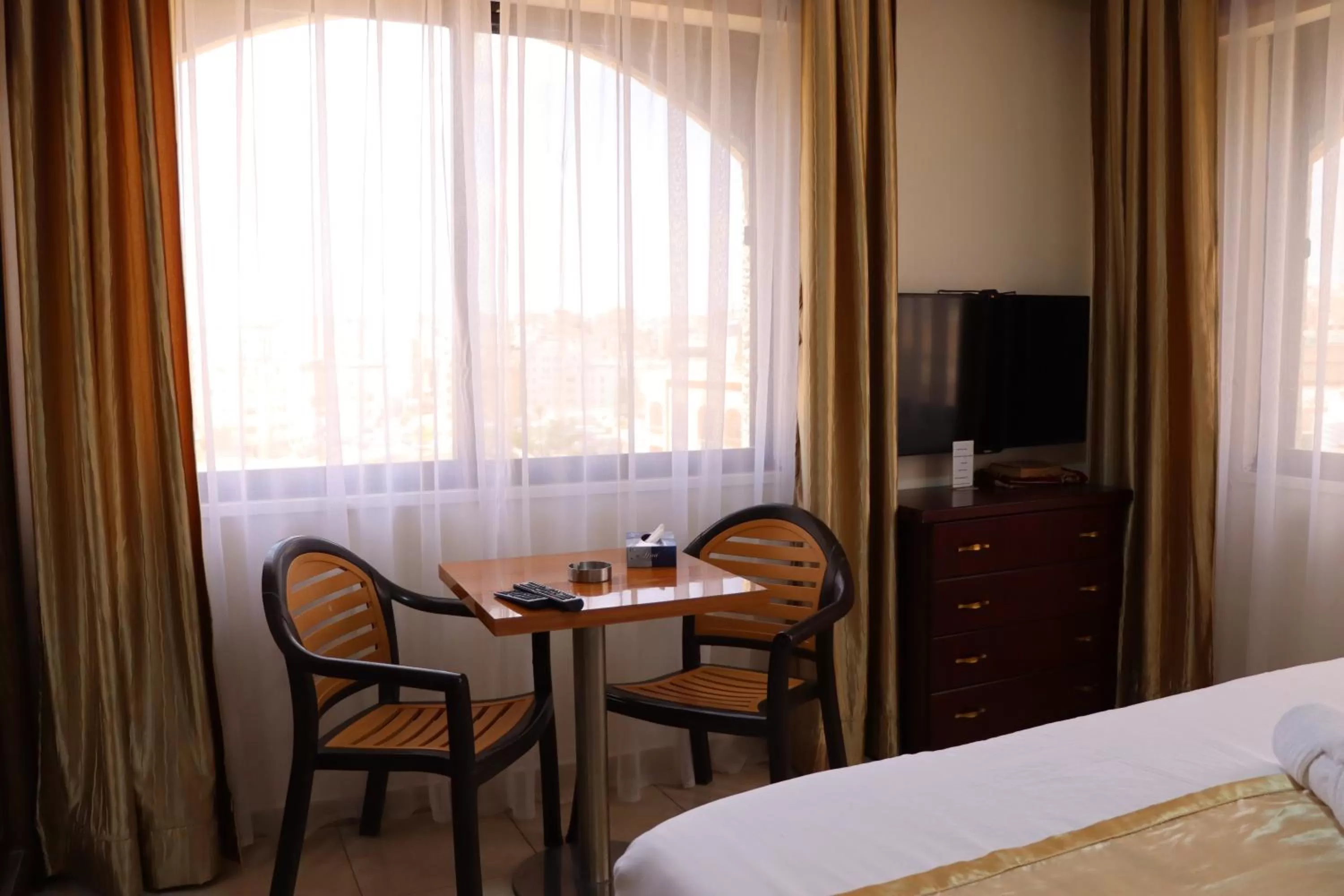 Dining area, Bed in Al Jamal Suites