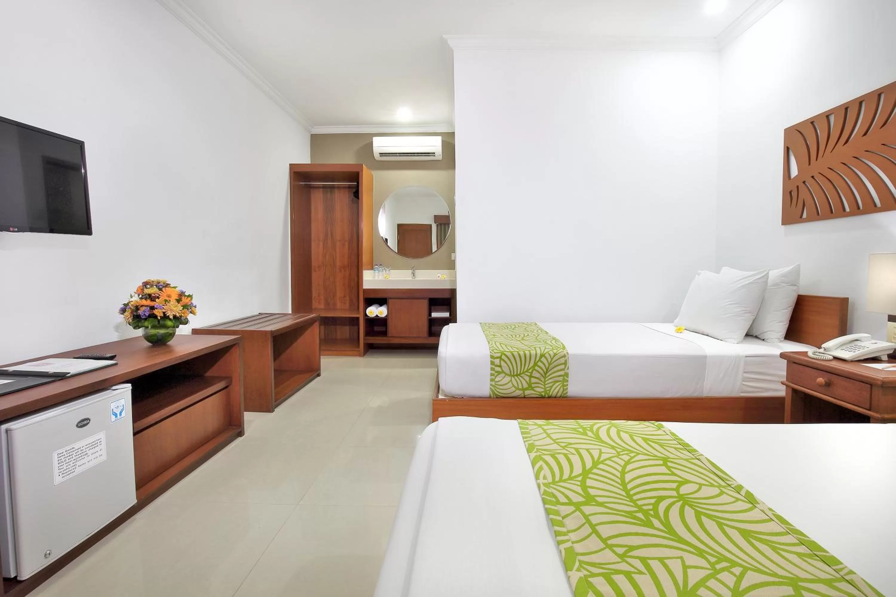 Photo of the whole room, Bed in Dewi Sri Hotel