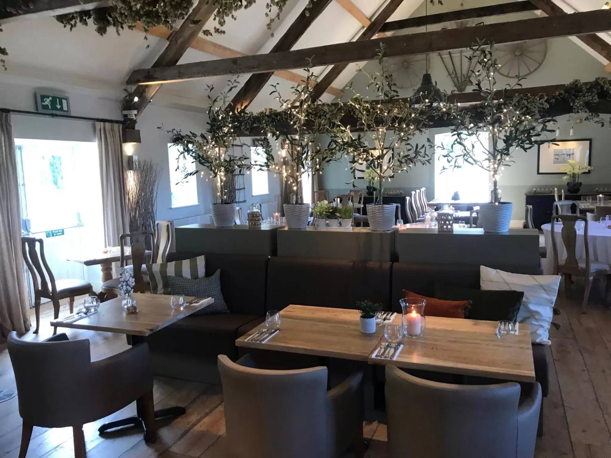 Lounge or bar in The Farmhouse at Bodnant Welsh Food