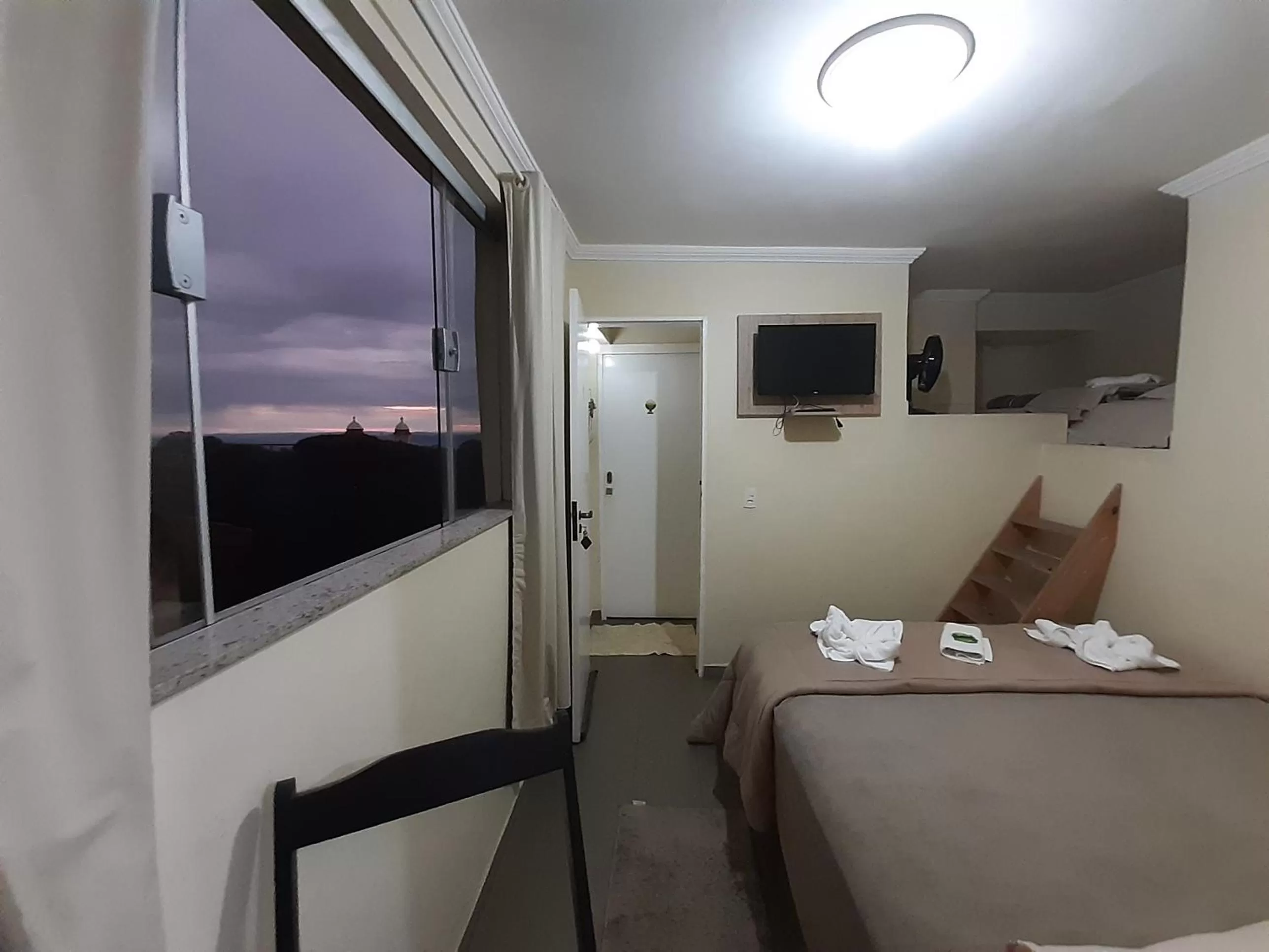 TV and multimedia, Bed in Pousada Reino Encantado - São Thomé das Letras - Minas Gerais