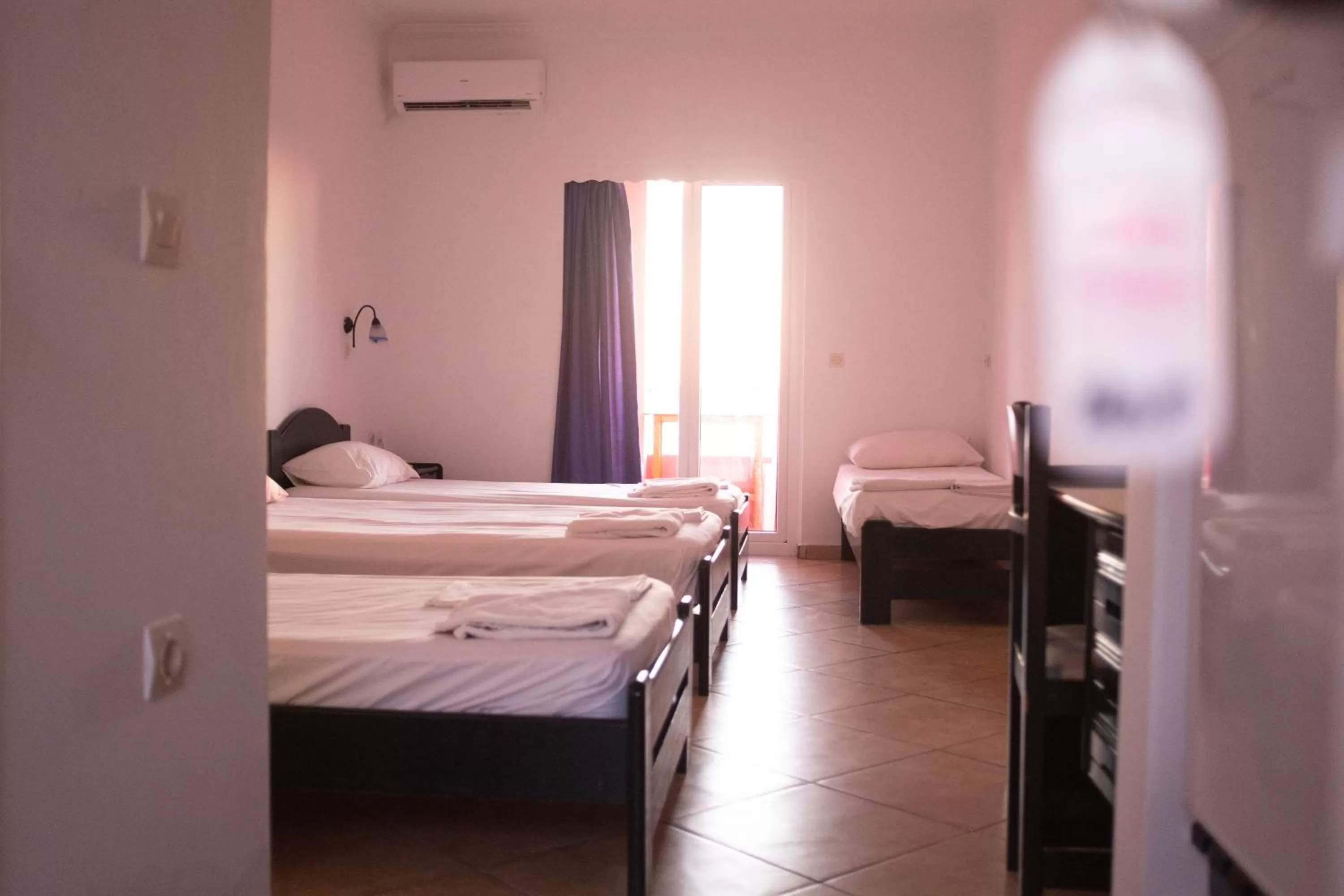 Bed in Pink Palace Beach Resort