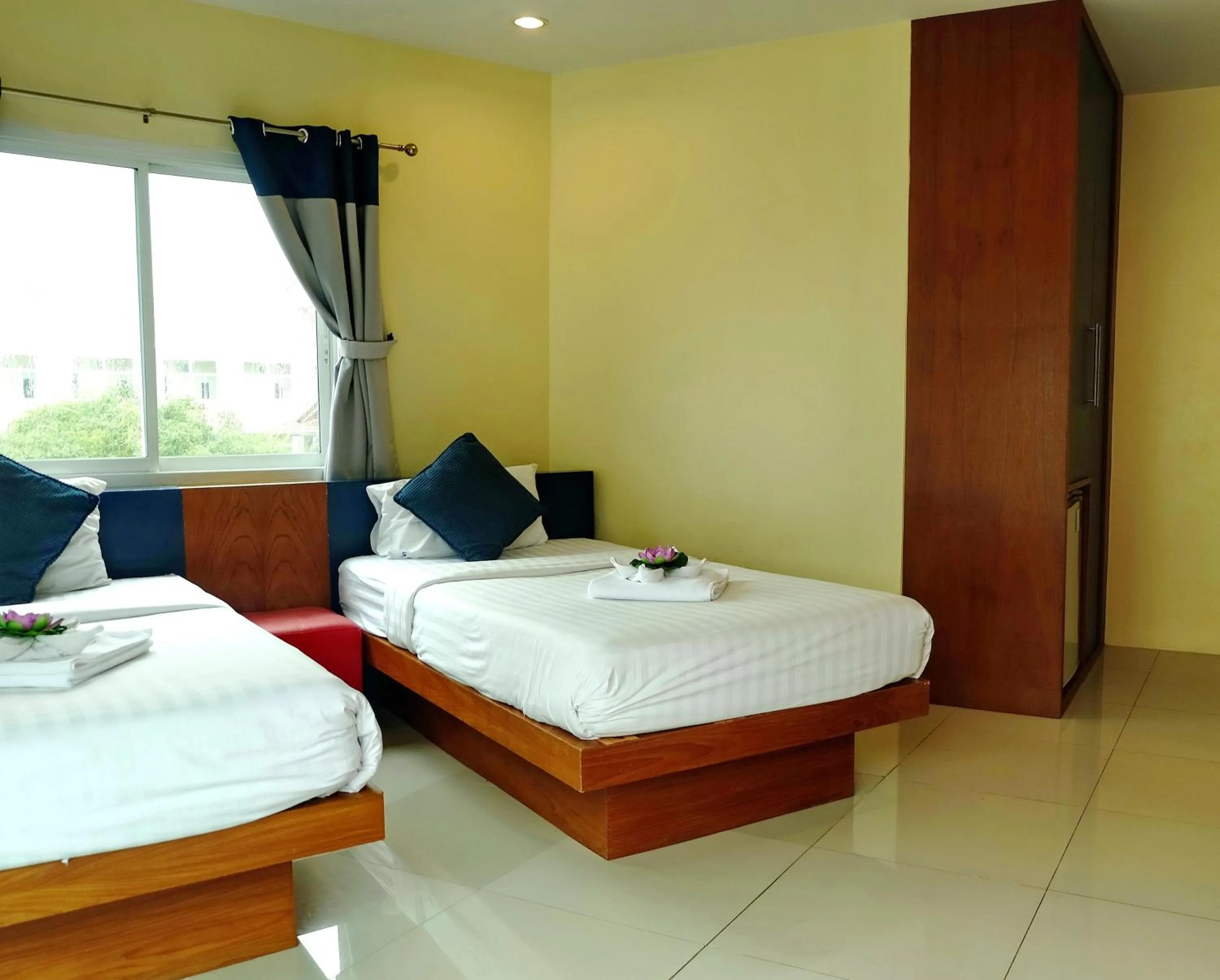 Bed in Calypso Patong Hotel