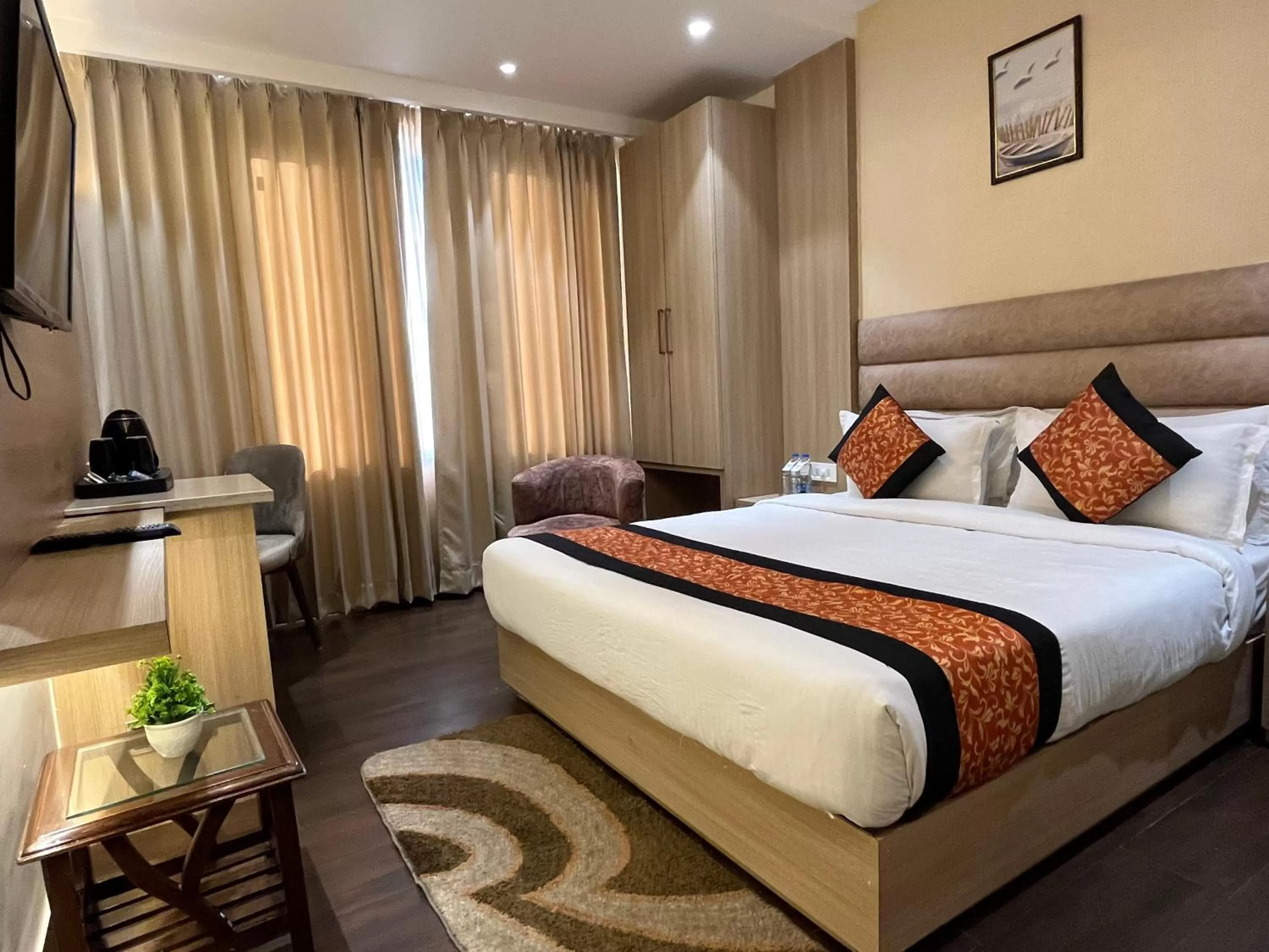 Photo of the whole room, Bed in RRV Hotel