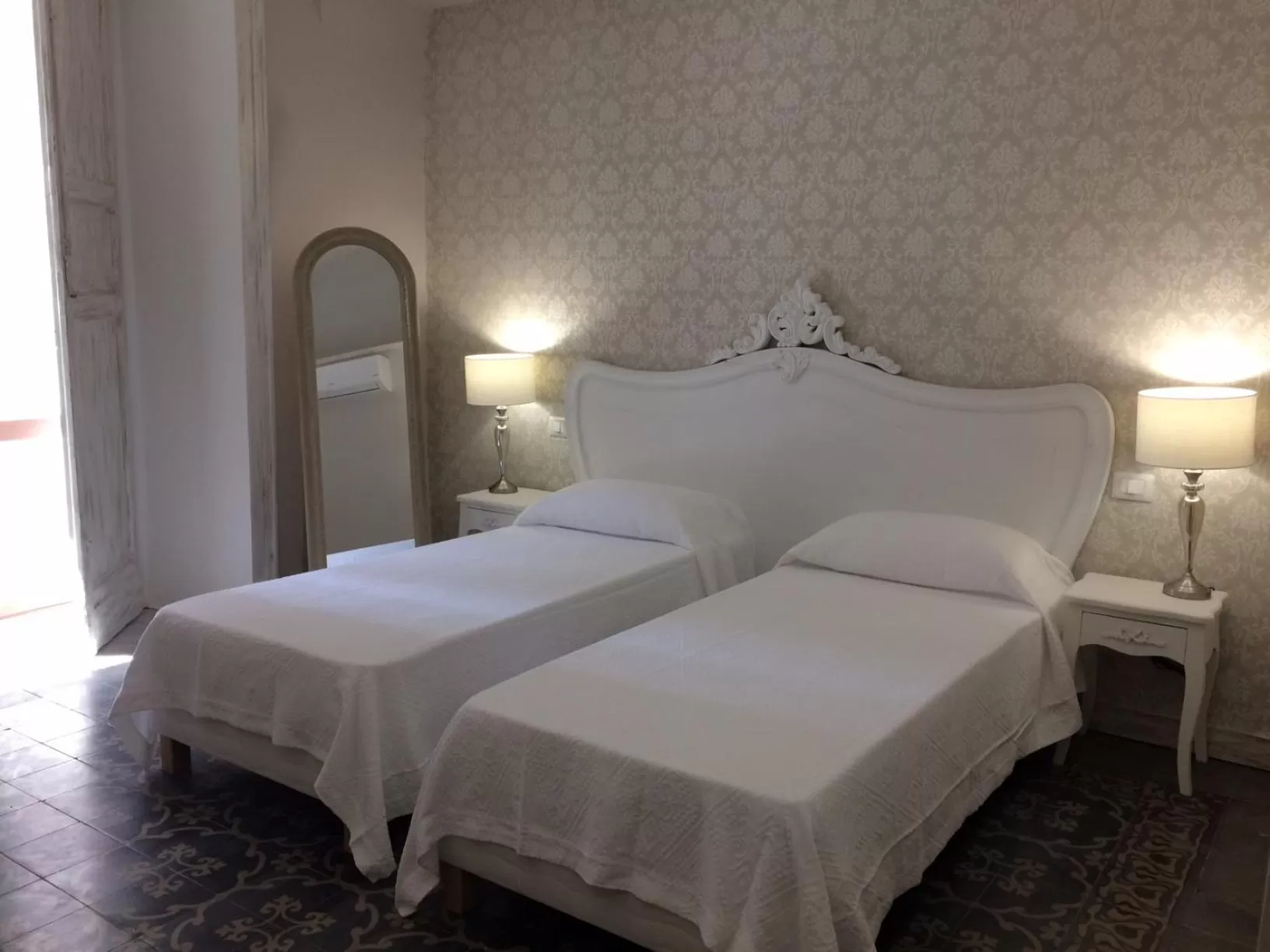 Bed in La Casa di Alma Luxury rooms