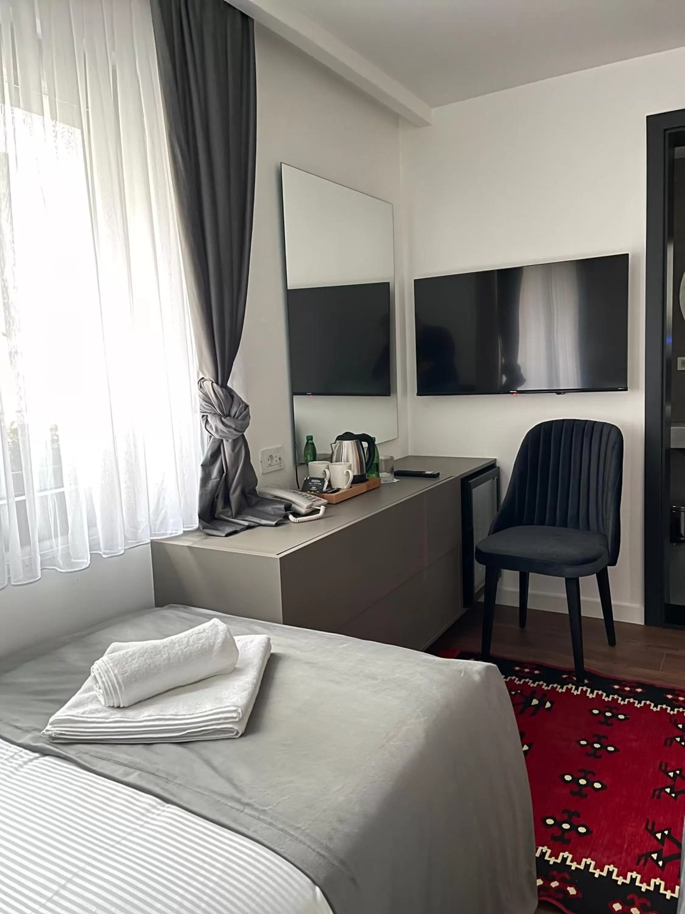 Bed in Etnomania Boutique Hotel