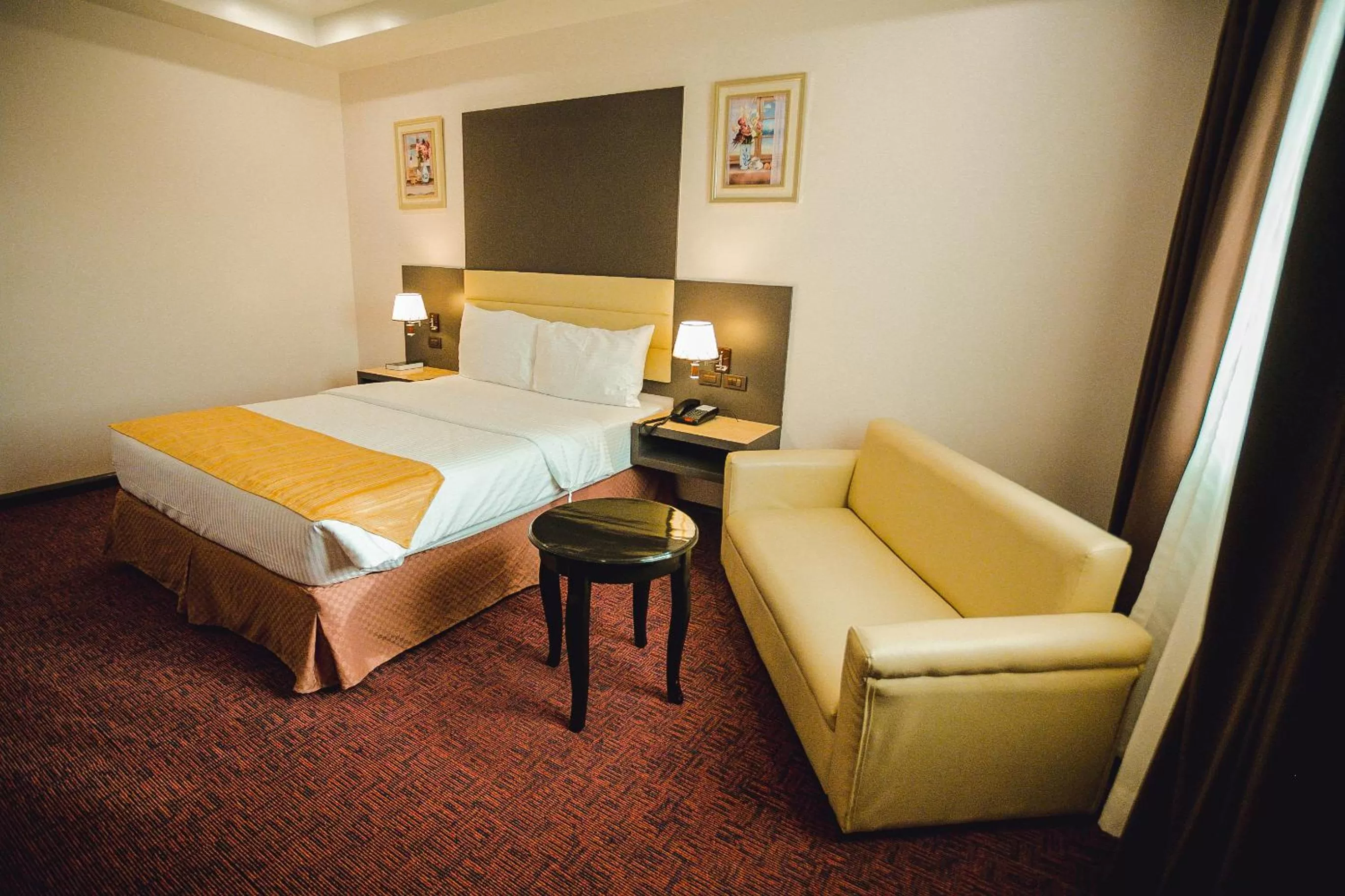 Seating area, Bed in Butuan Grand Palace Hotel