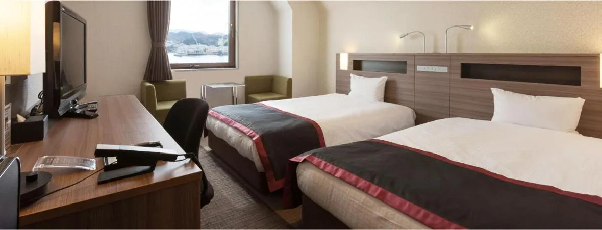 Bed in Onomichi Kokusai Hotel