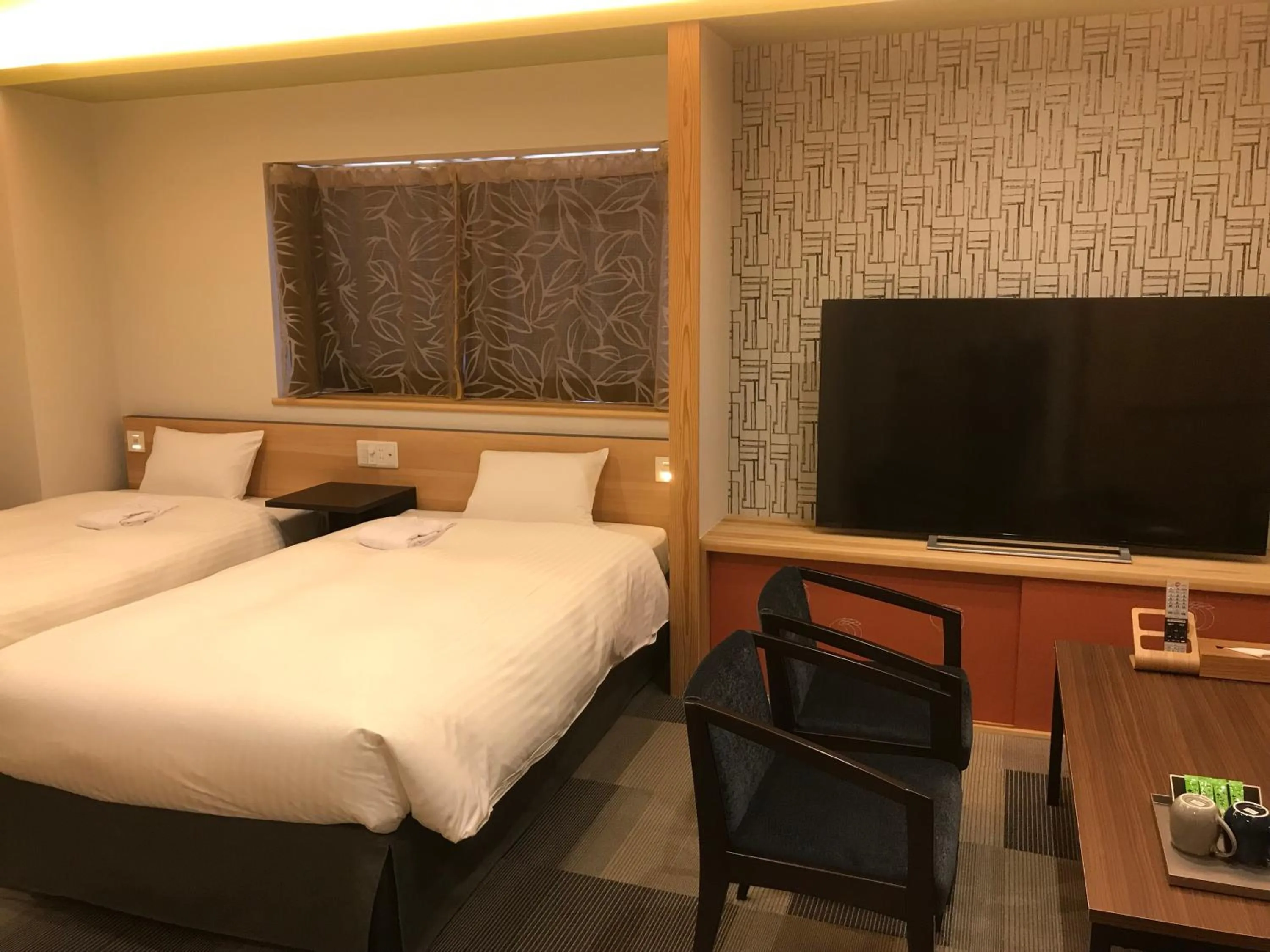 Photo of the whole room, Bed in Hotel Yururito Osaka