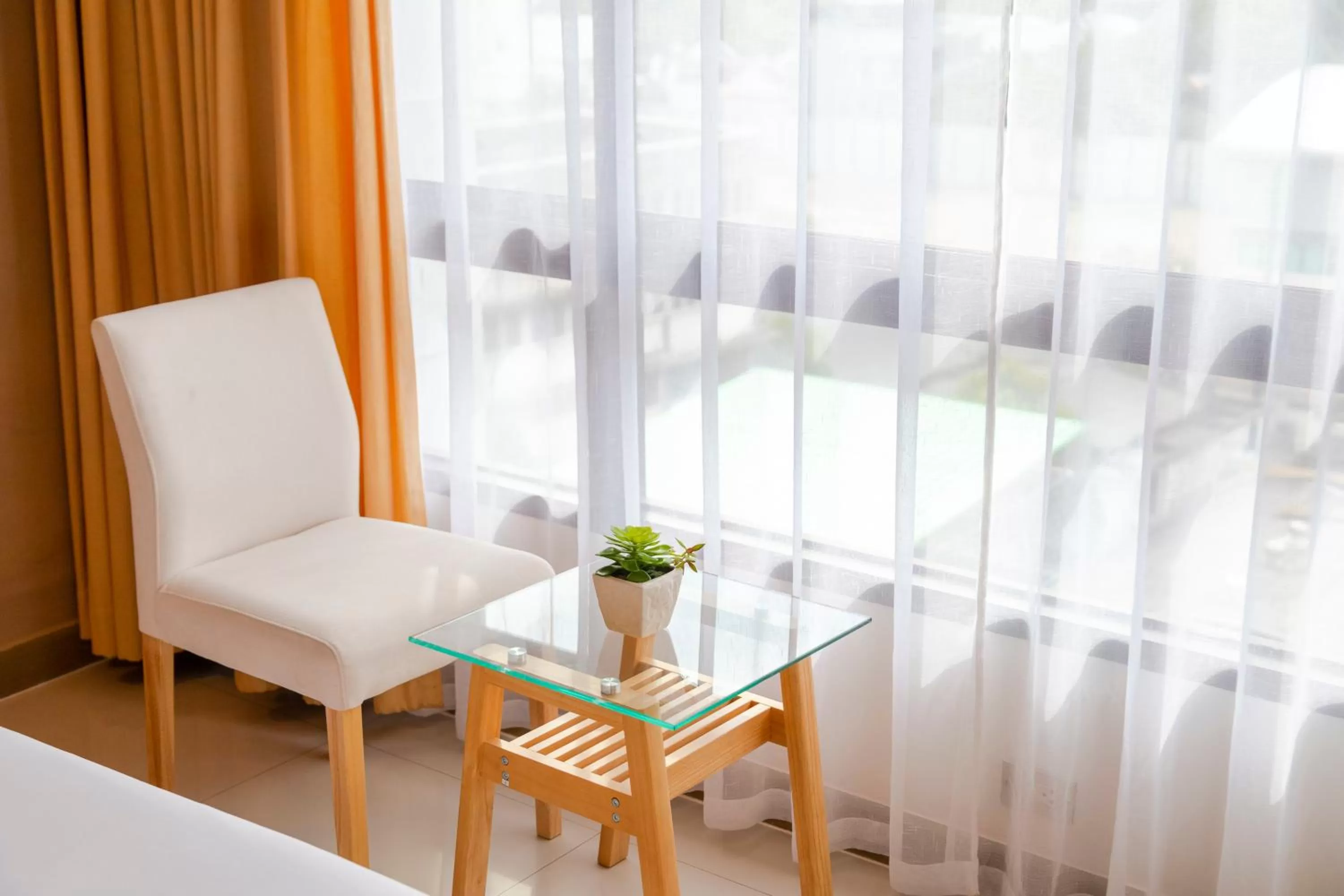 Living room in Pinnacle Lumpini Park Hotel