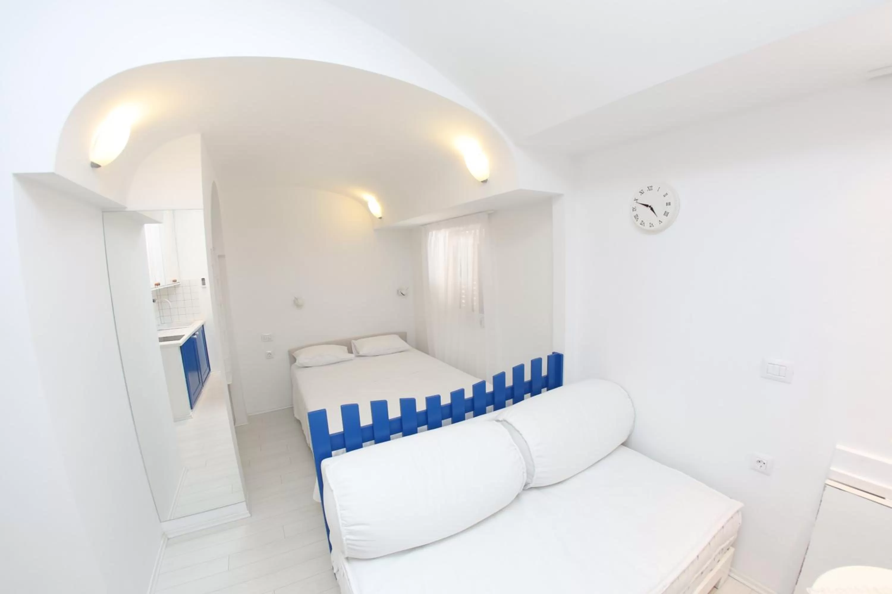 Bed in Central Apartments Integrated Hotel