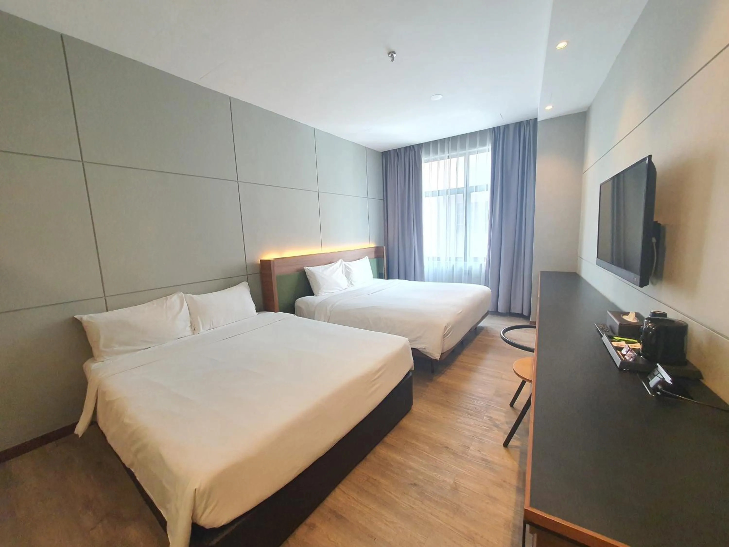 Bed in Ceria Hotel
