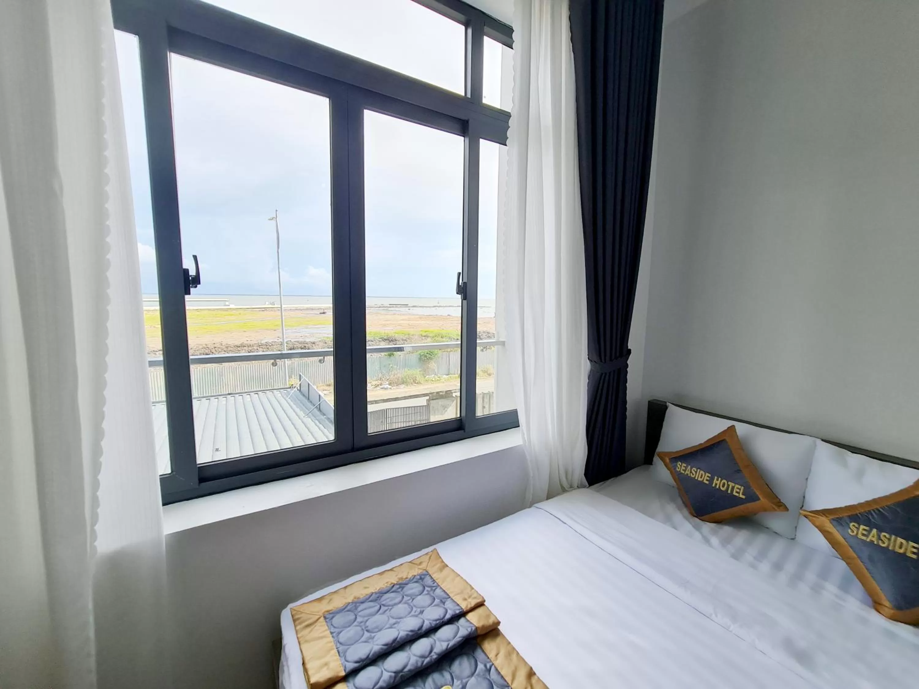 View (from property/room), Bed in Seaside Hotel - Rach Gia