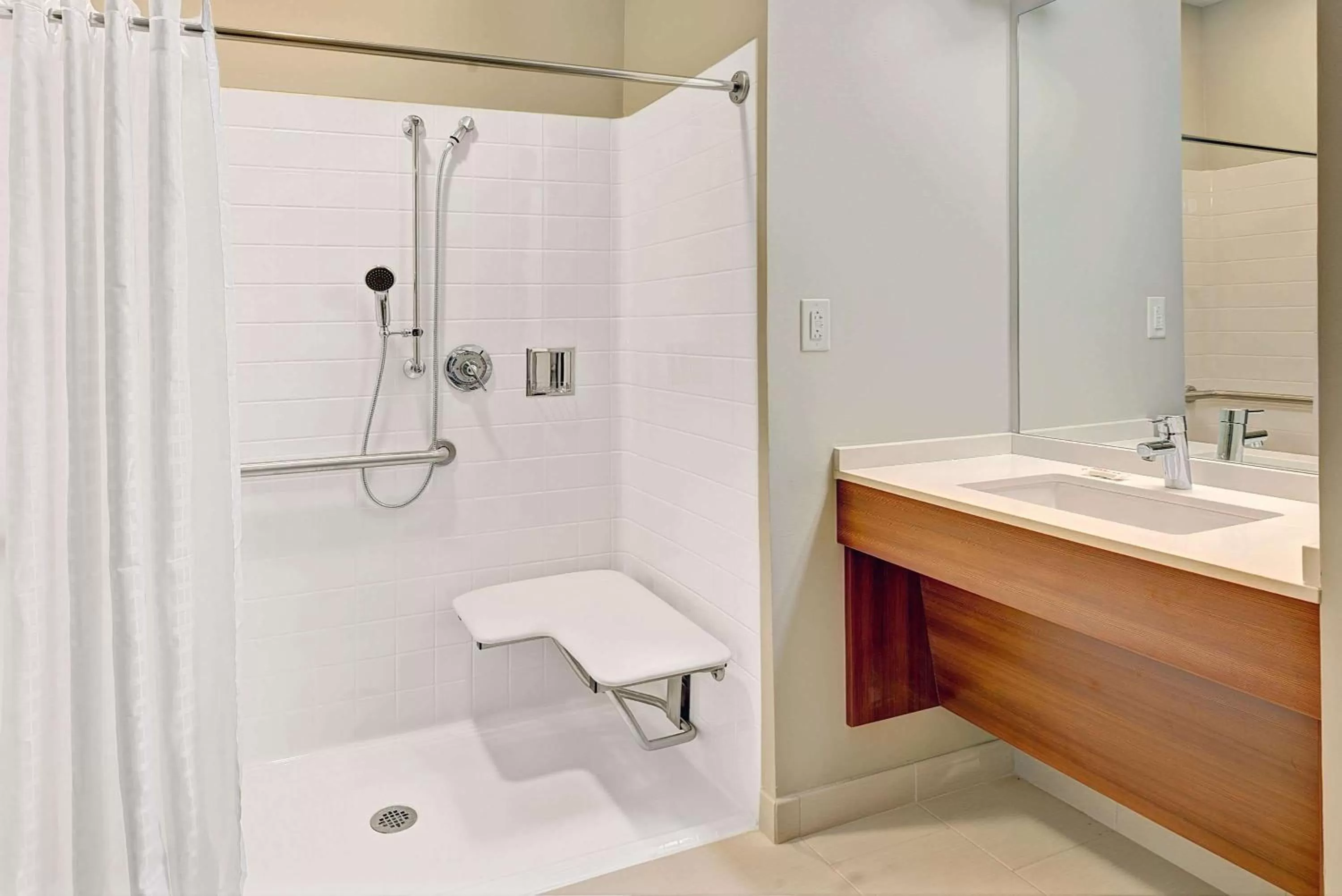 Bathroom in Microtel Inn & Suites by Wyndham Philadelphia Airport Ridley Park