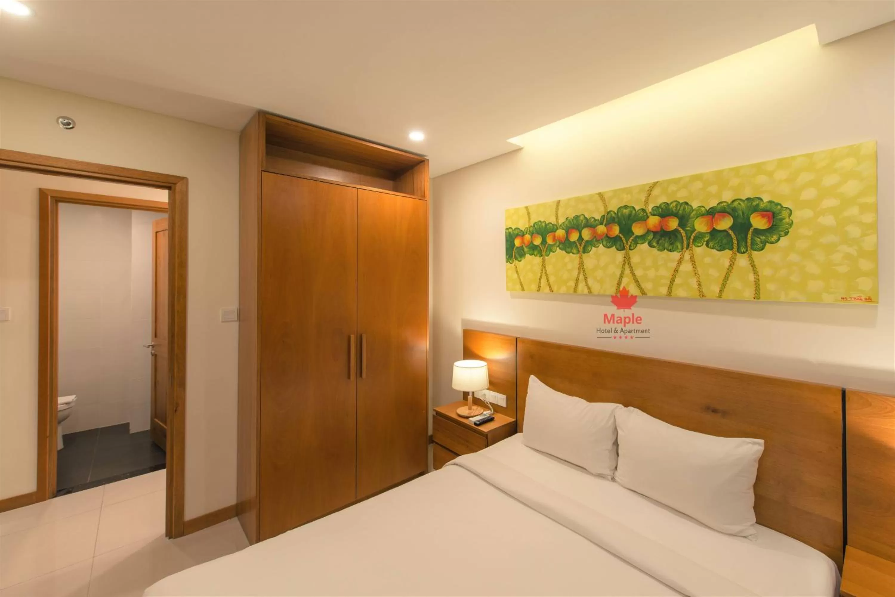 Photo of the whole room, Bed in Maple Hotel & Apartment