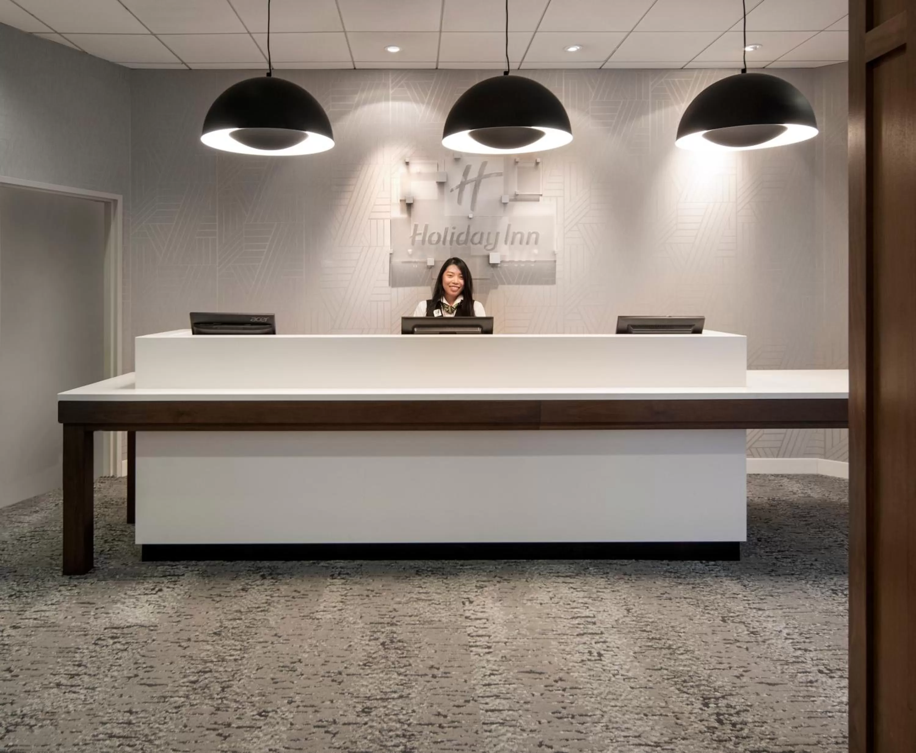 Staff in Holiday Inn Montreal Longueuil by IHG