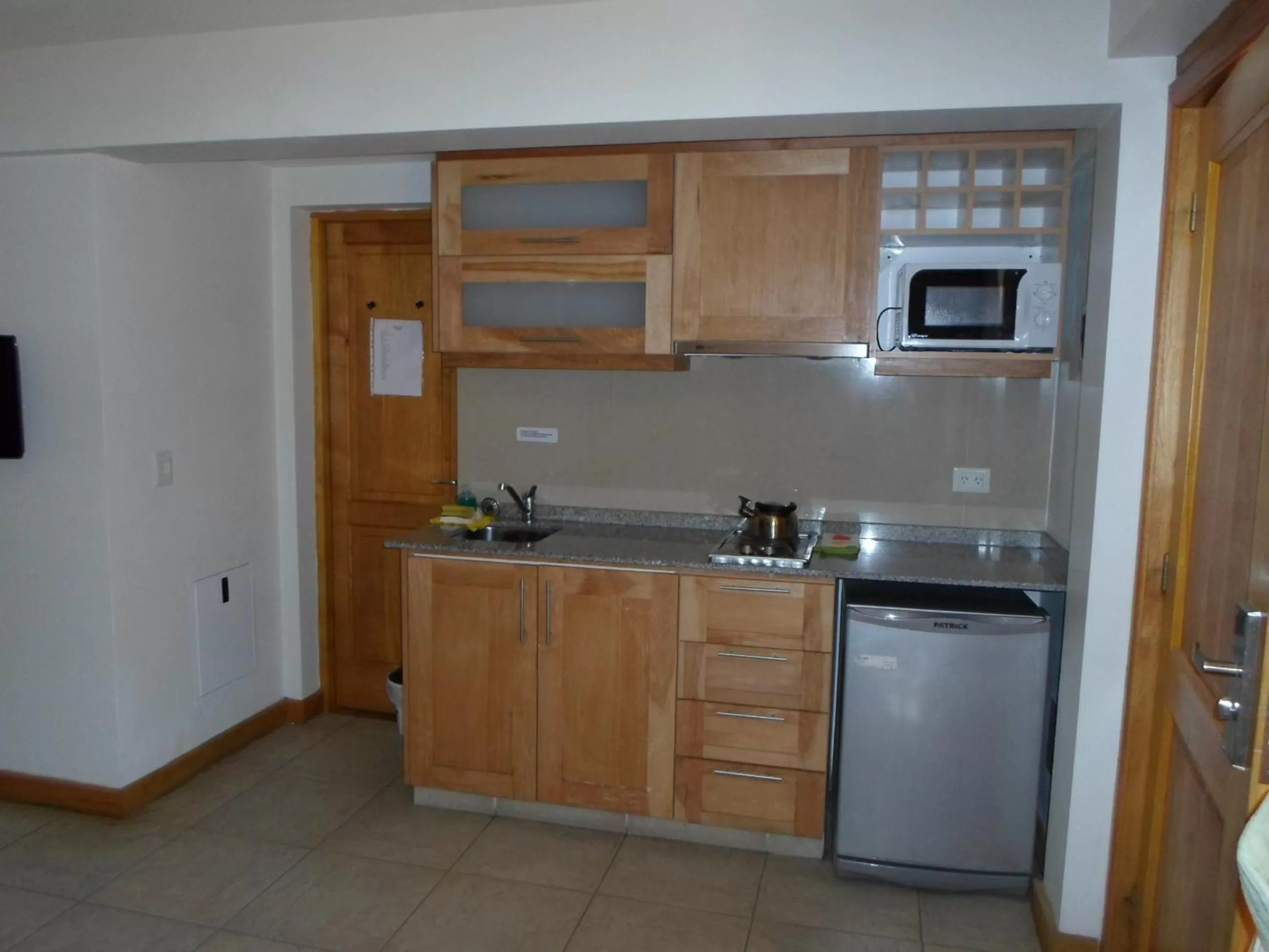 Kitchen or kitchenette in Apart Hotel Robles del Sur