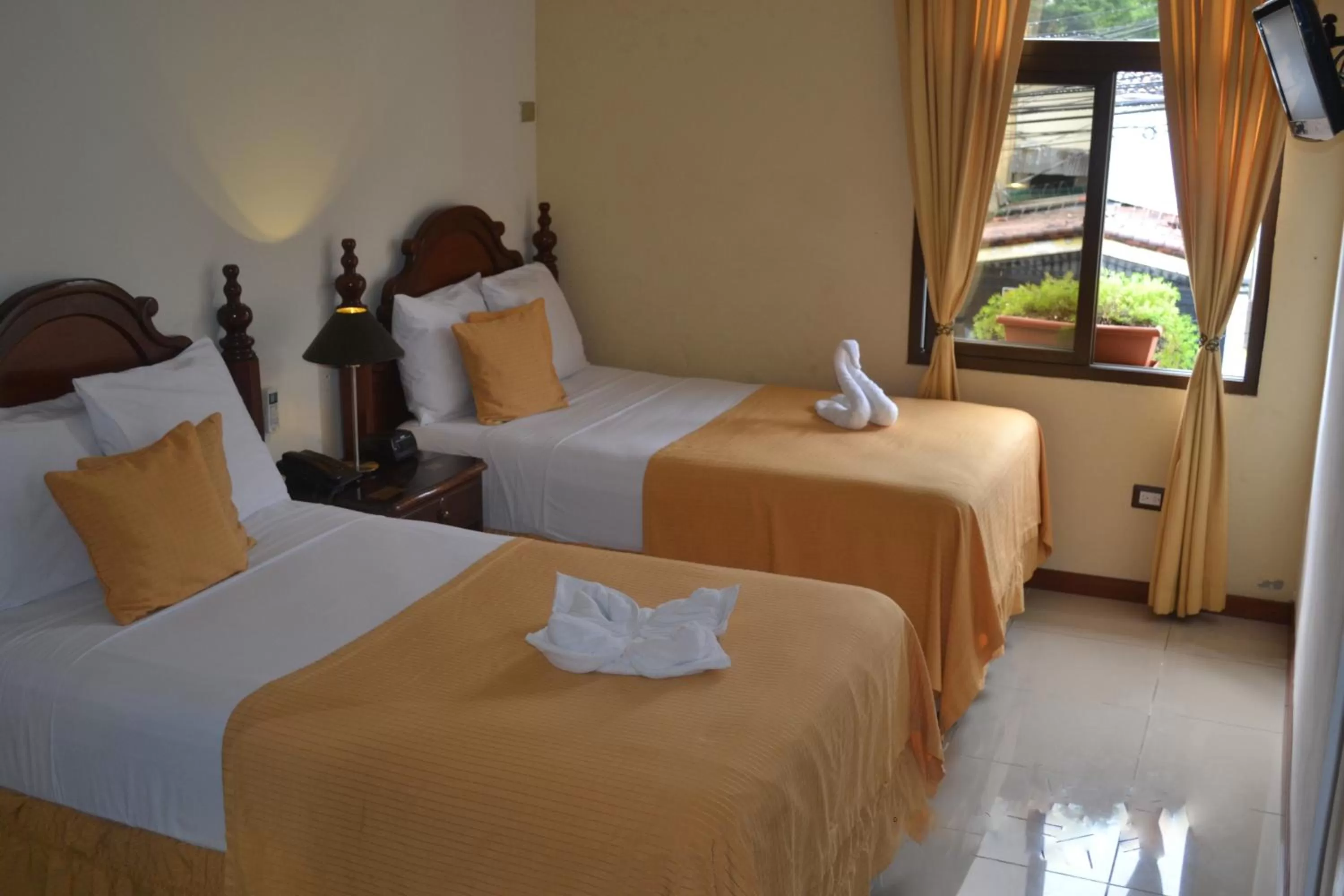 Photo of the whole room, Bed in Hotel Villa Florencia Zona Rosa