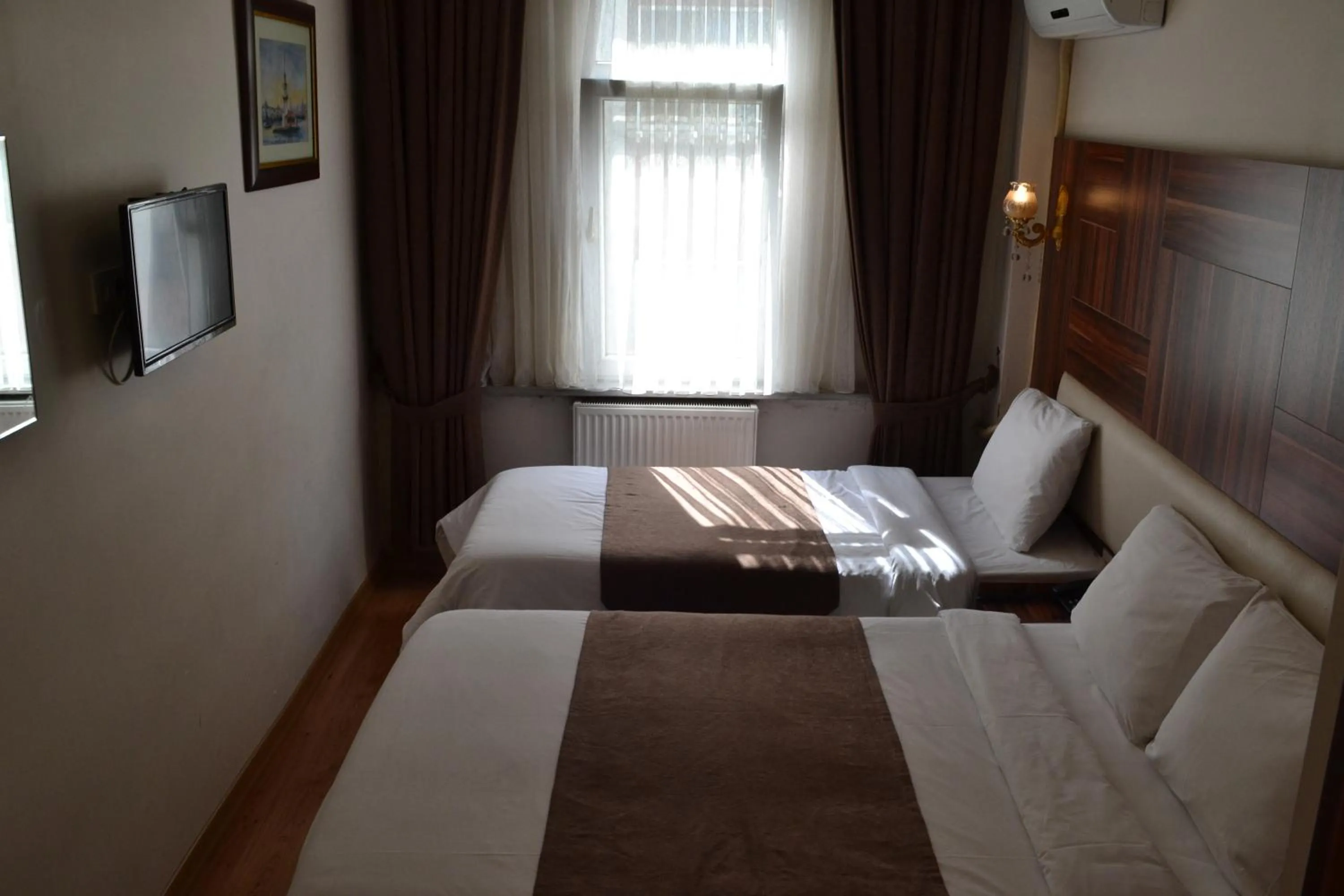 TV and multimedia, Bed in New Fatih Hotel