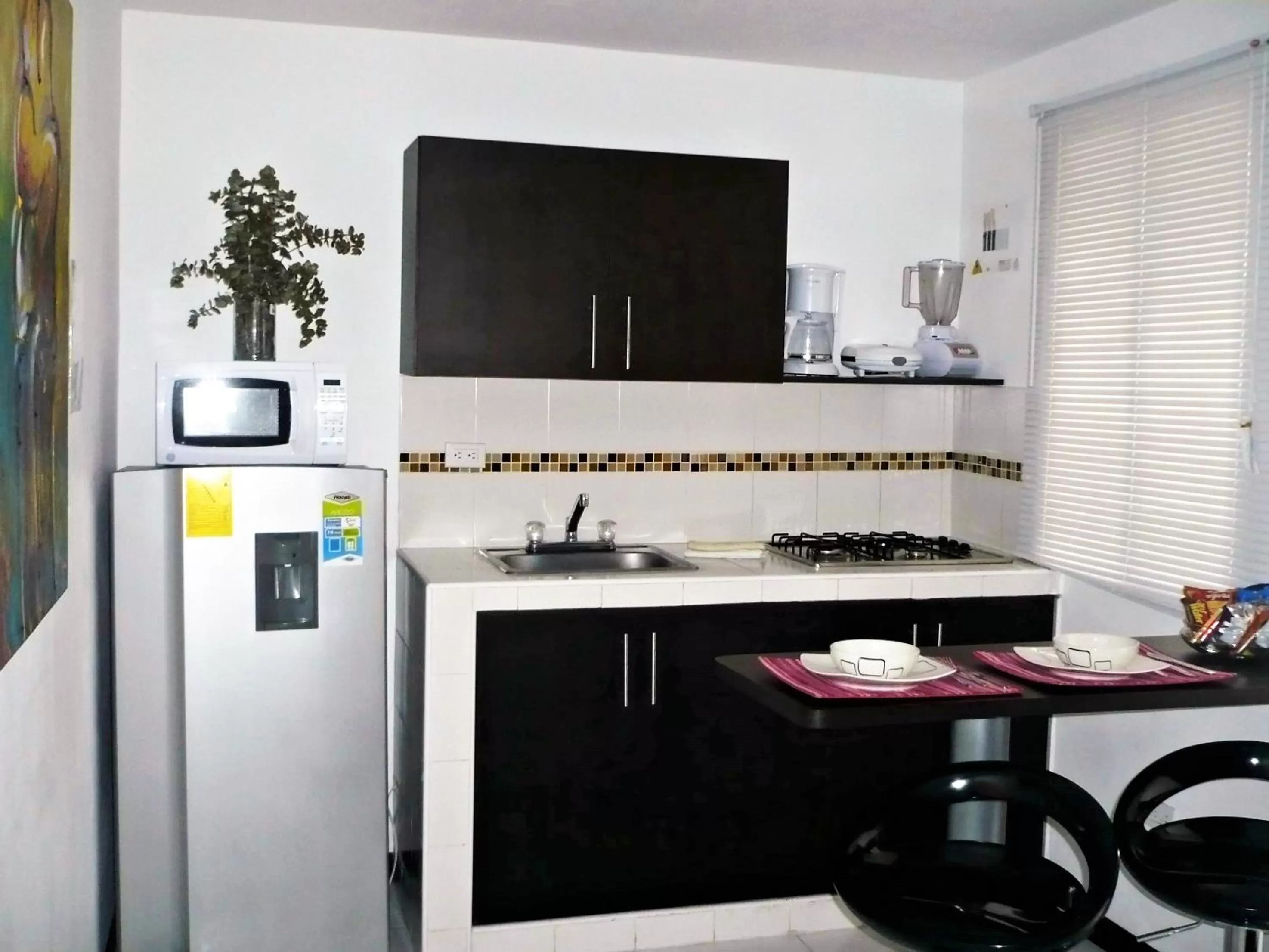 Dining area in Apartasuites San Marcos