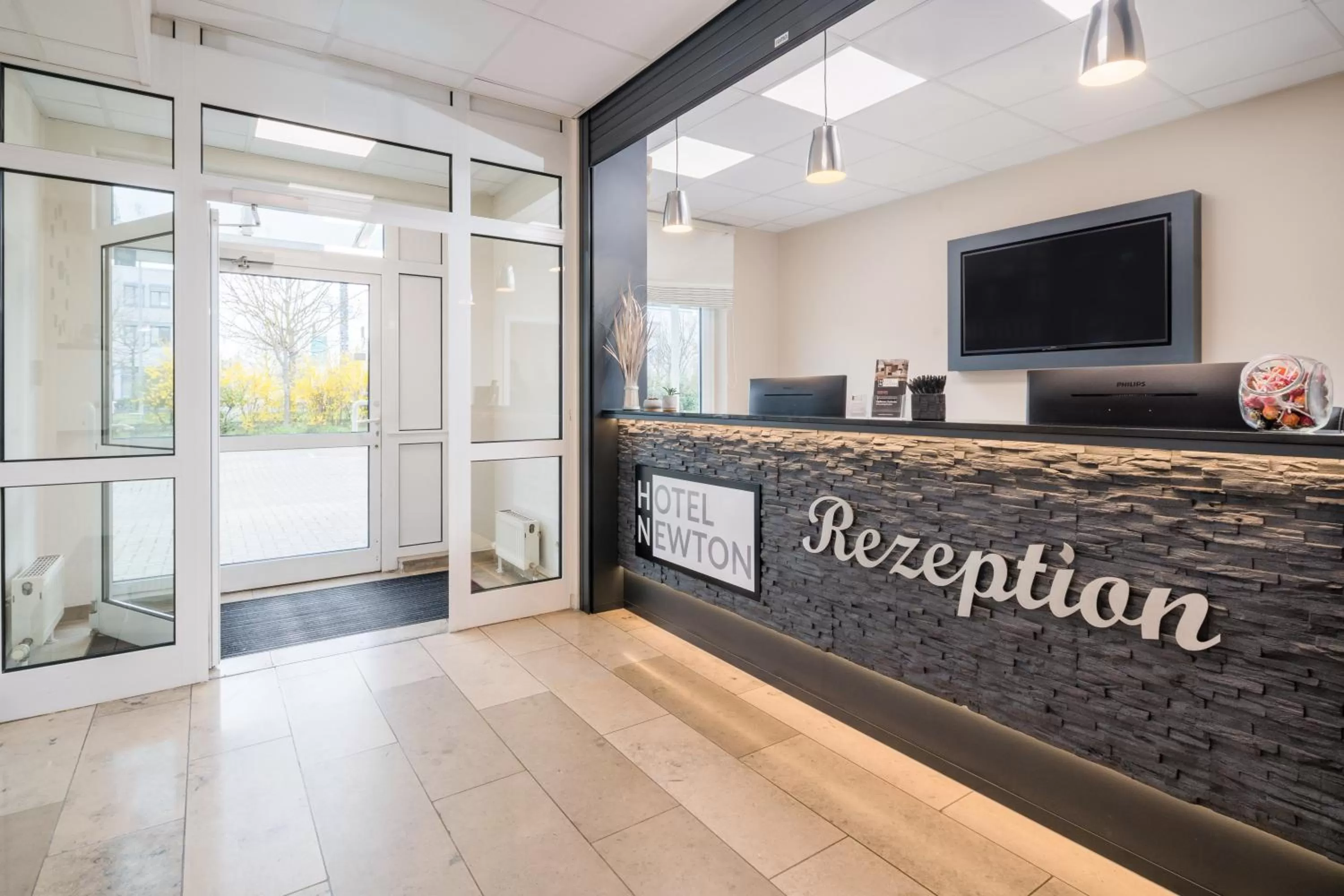Lobby or reception in Hotel Newton Karlsruhe
