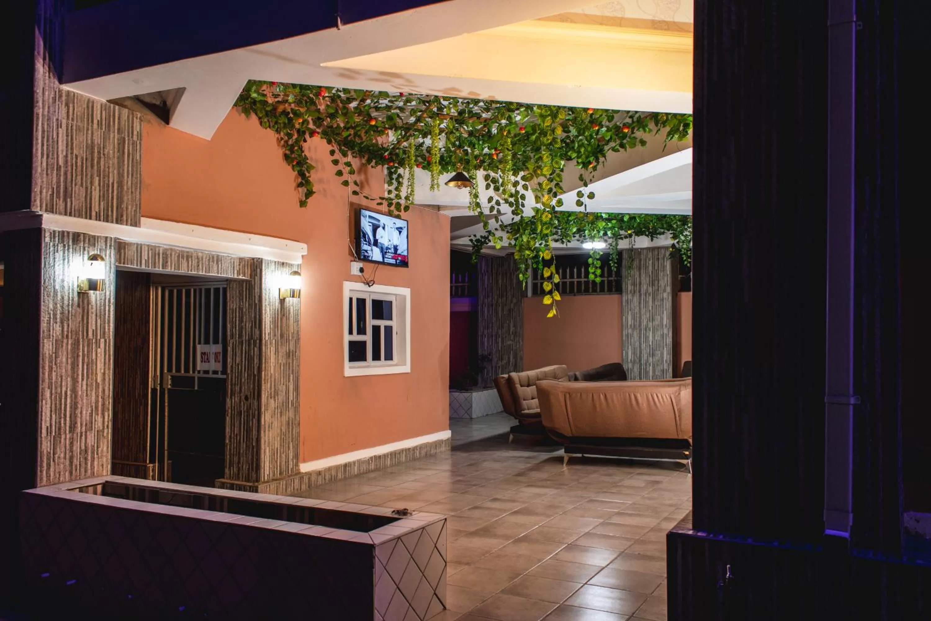 Communal lounge/ TV room in Gold Crown International Hotel Johannesburg