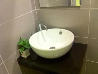 Toilet in The Regency Garden Hotel