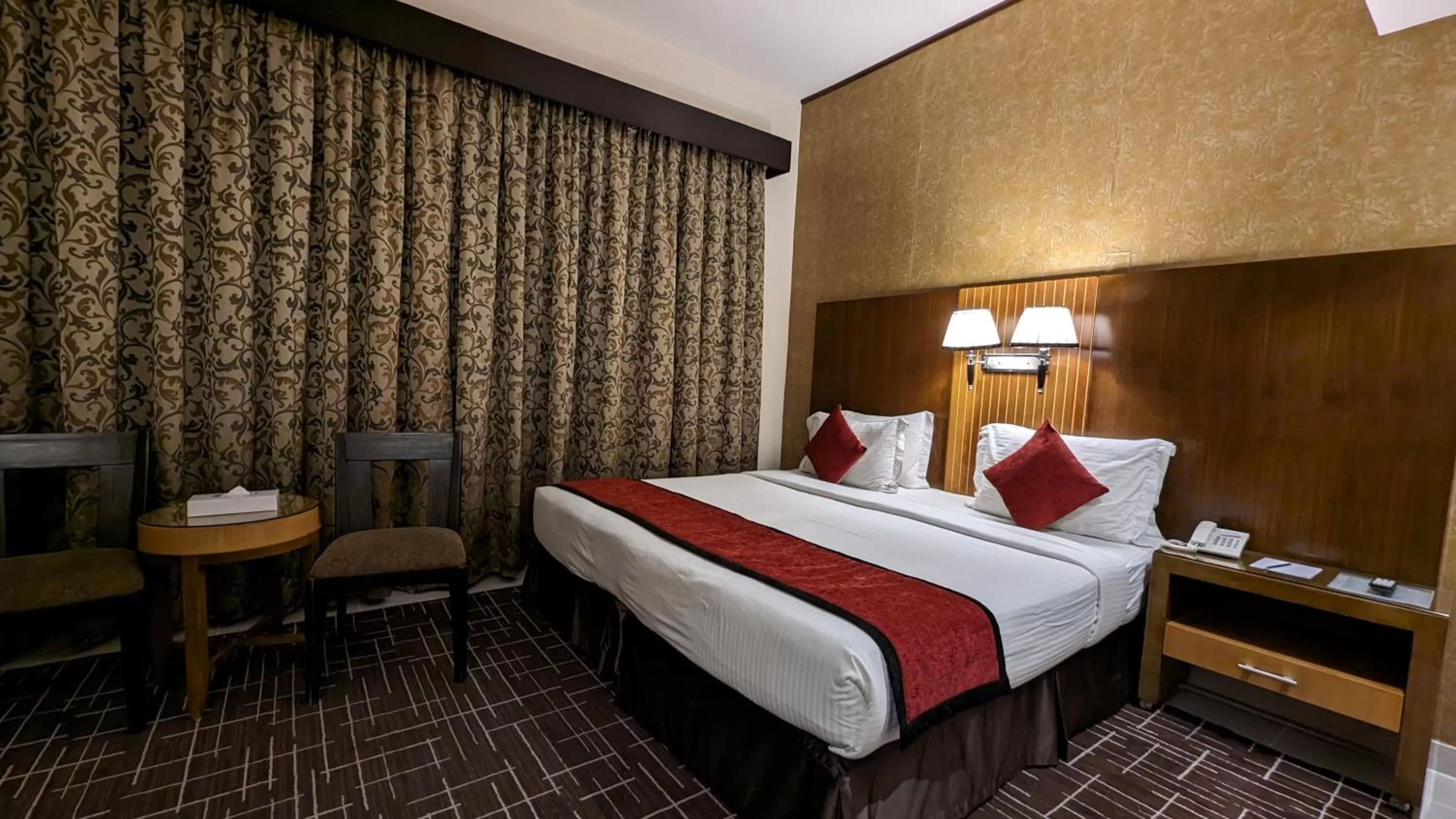 Bed in City Tower Hotel