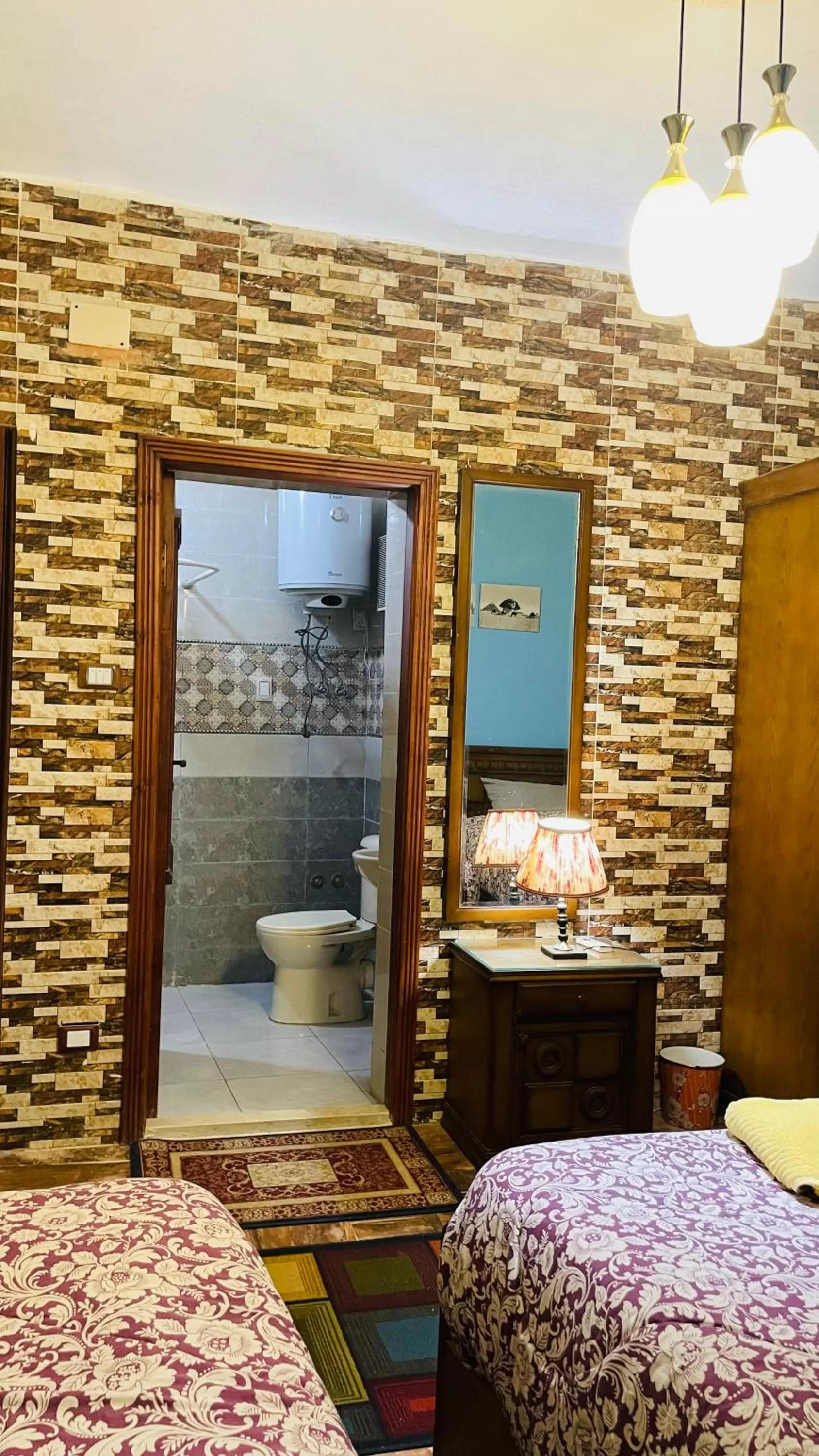 Bed in Sphinx palace pyramids view