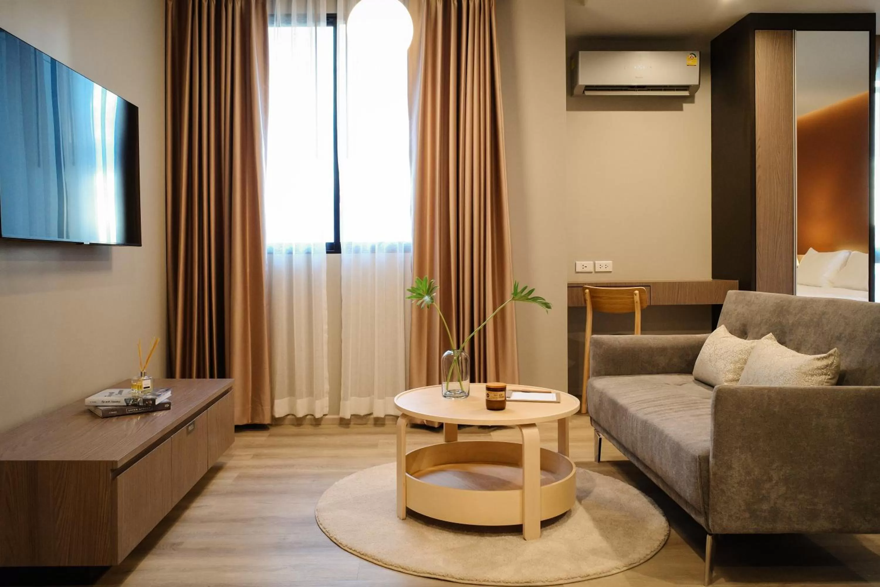 Living room, Bed in The Rise Suites Hotel, Chiang Mai - SHA Extra Plus